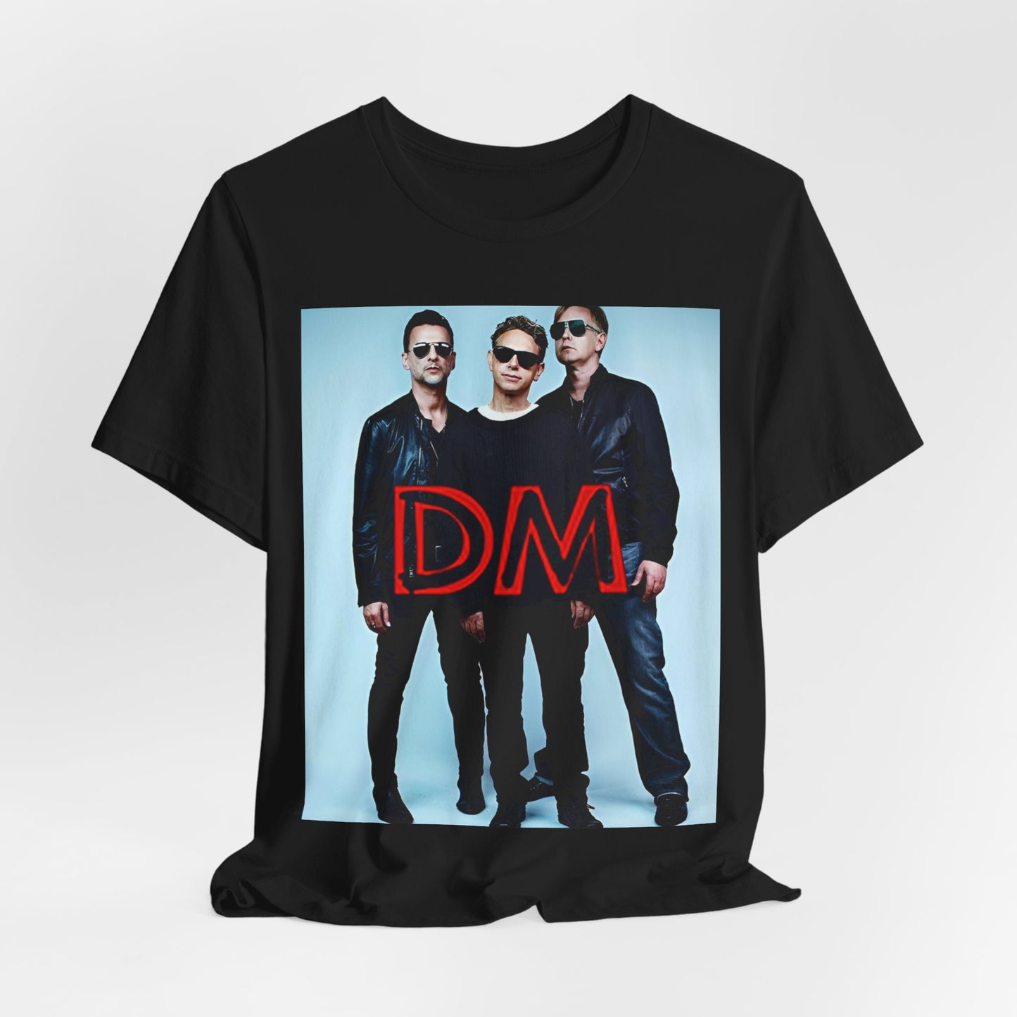 A black graphic t-shirt featuring a retro electropop graphic of Depeche Mode.