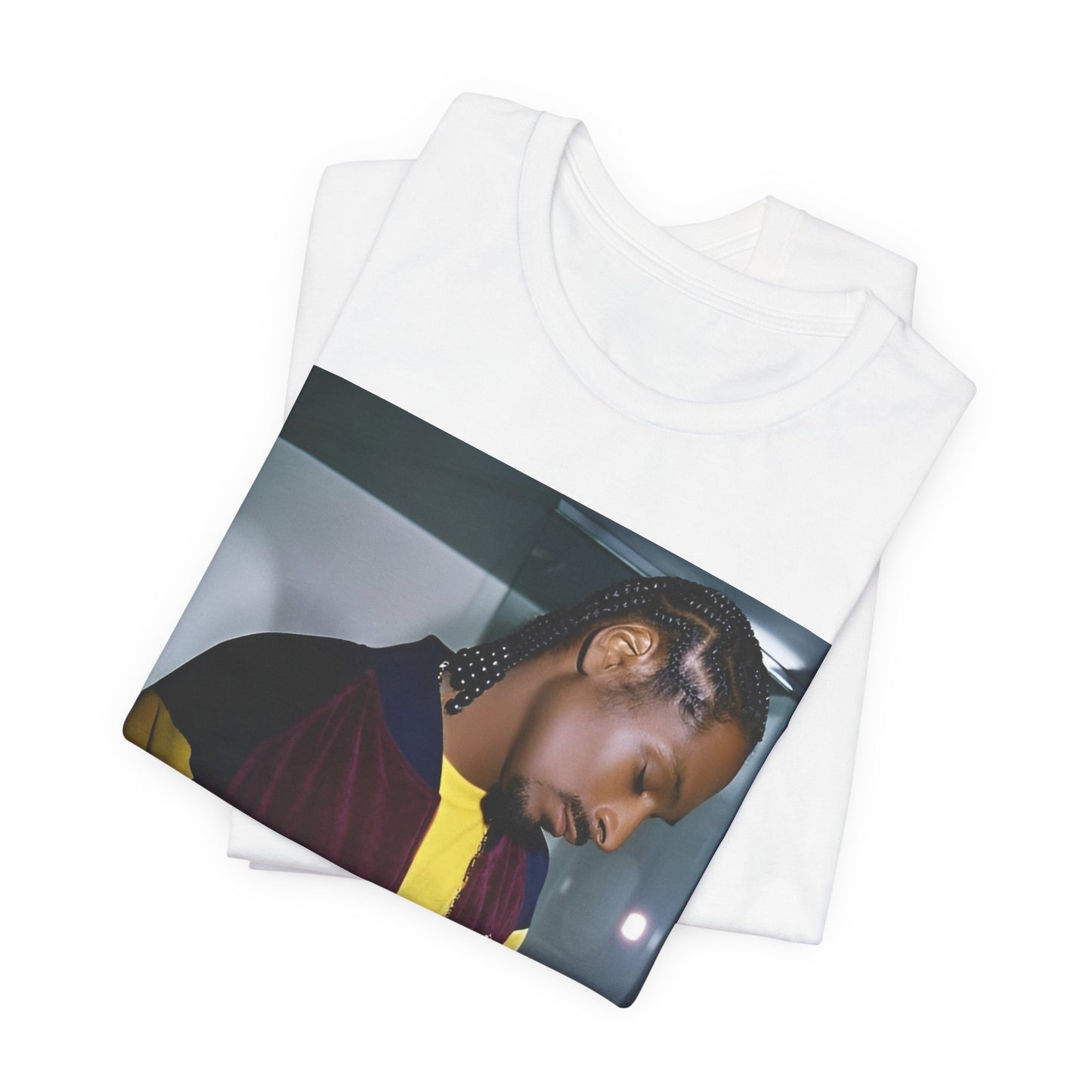 A black graphic t-shirt featuring a classic graphic of Snoop Dogg with a cool gaze.