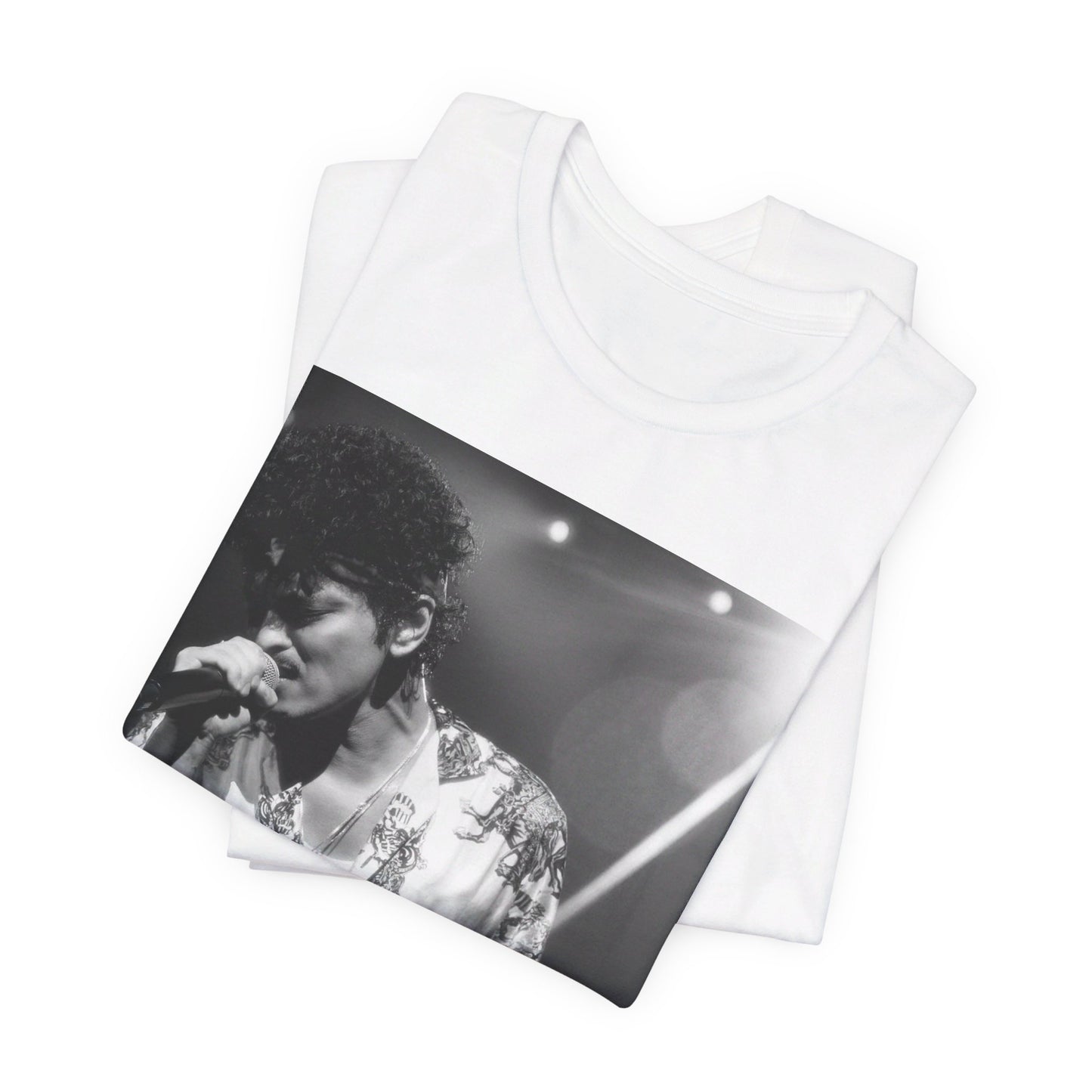 A black graphic t-shirt featuring a retro-style graphic of Bruno Mars as a soul icon.