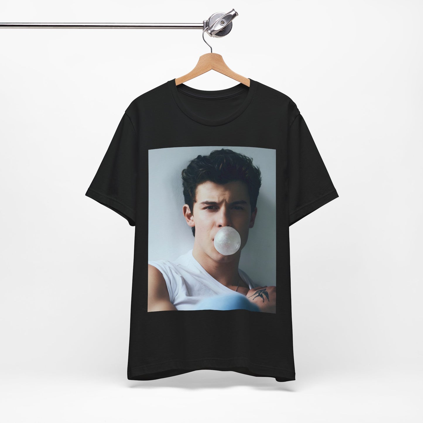 A black graphic t-shirt featuring a photo of Shawn Mendes with a fierce, confident gaze.