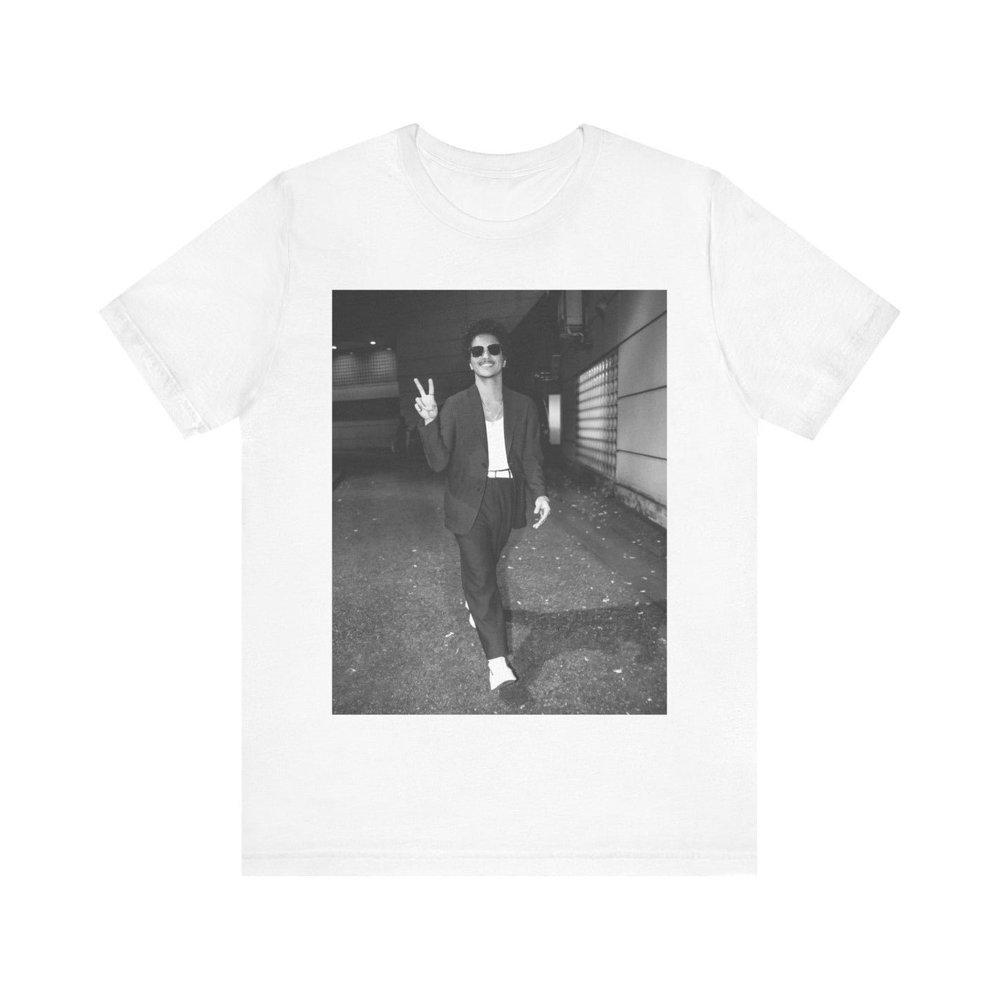 A black graphic t-shirt featuring a black and white graphic or photo of Bruno Mars in a backstage setting.