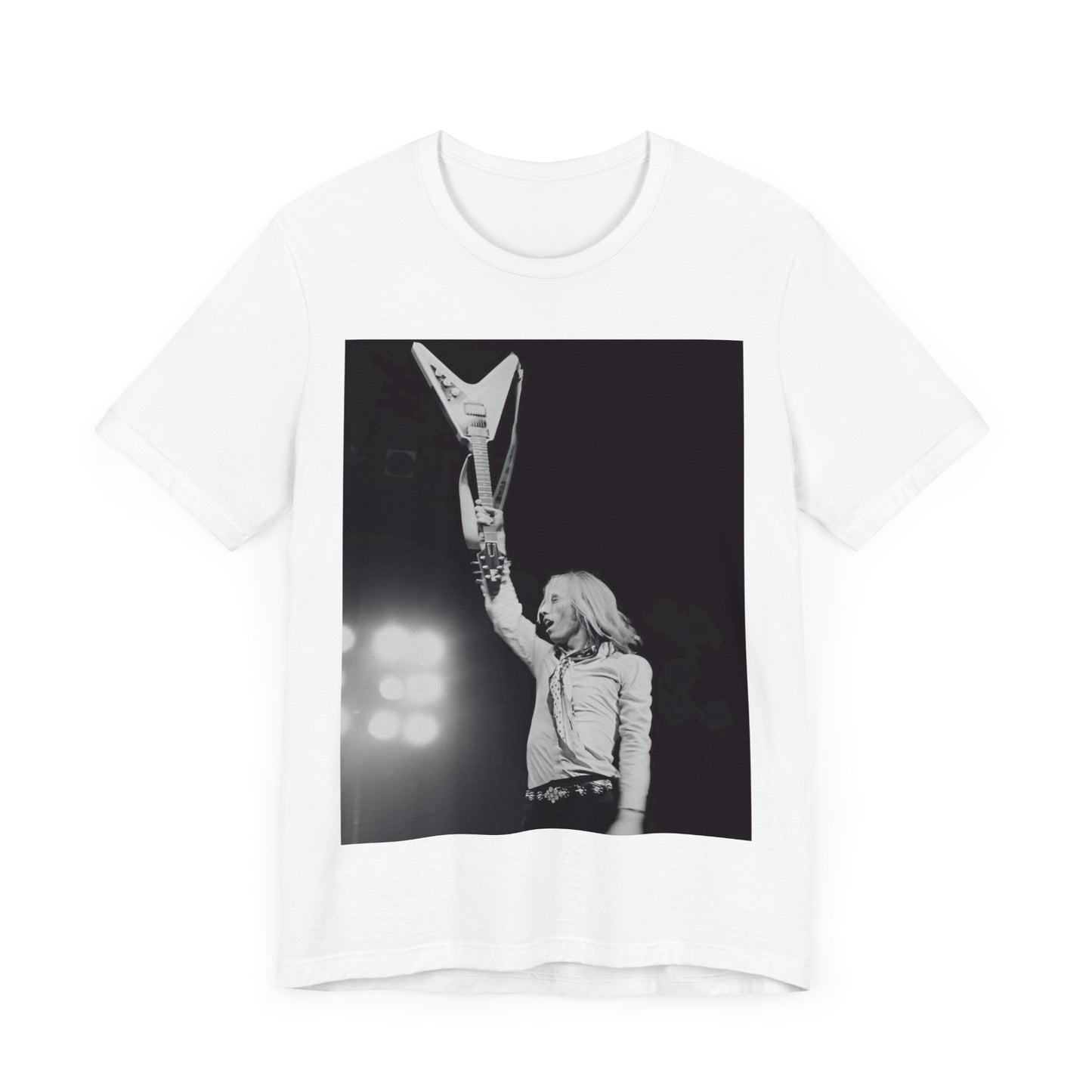 A black graphic t-shirt featuring a graphic or photo of Tom Petty playing guitar on stage.