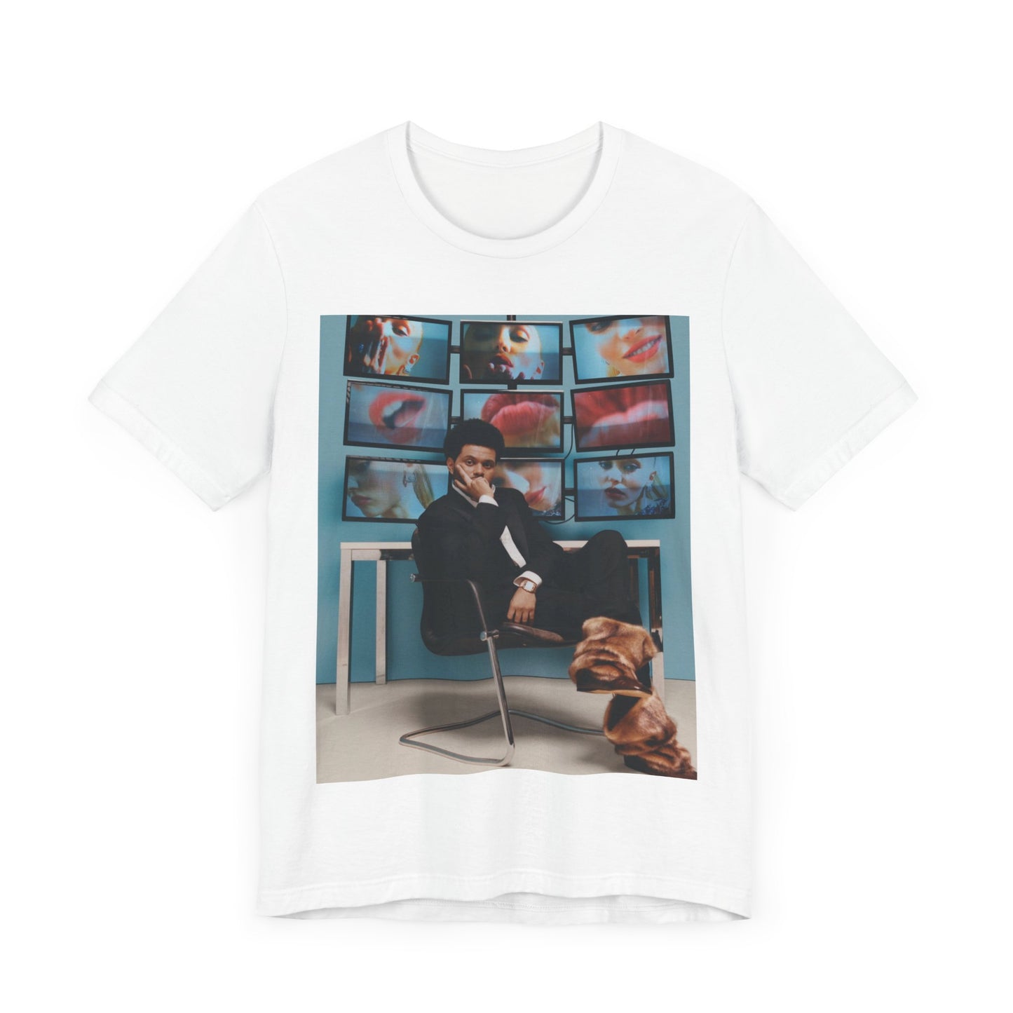 A black graphic t-shirt featuring an aesthetic graphic of The Weeknd.