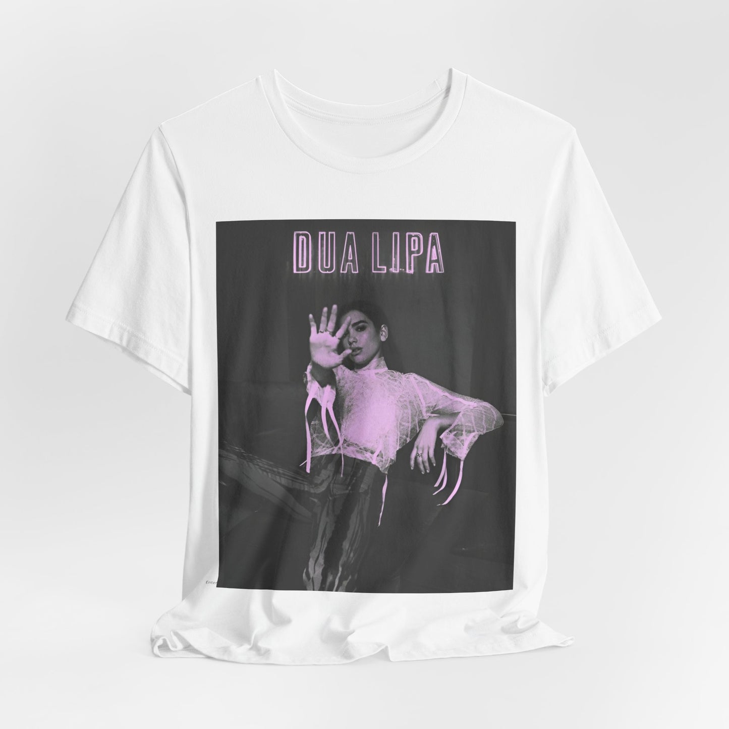 A black graphic t-shirt featuring a photo of Dua Lipa with a pink monochrome effect.