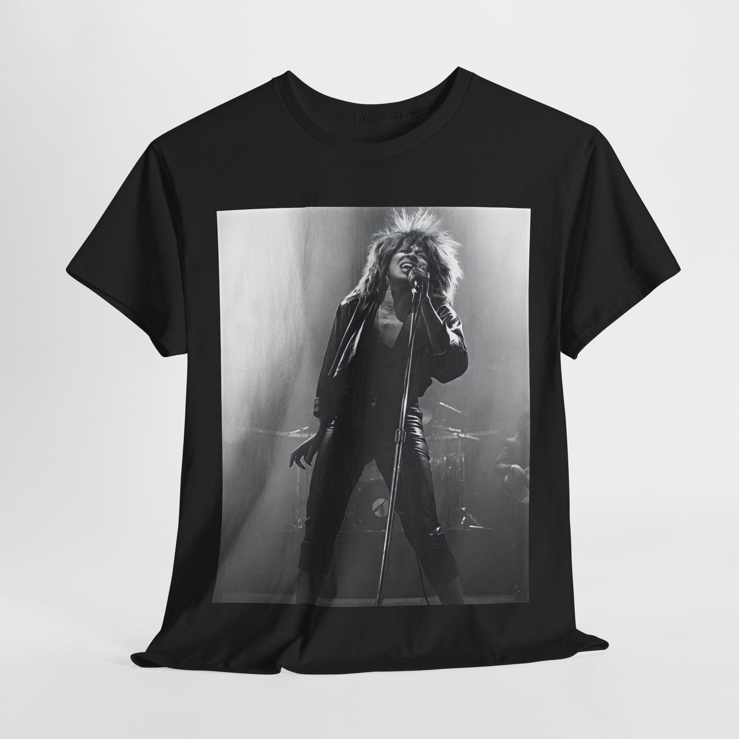 A black graphic t-shirt featuring a graphic of Tina Turner performing "Proud Mary" live.