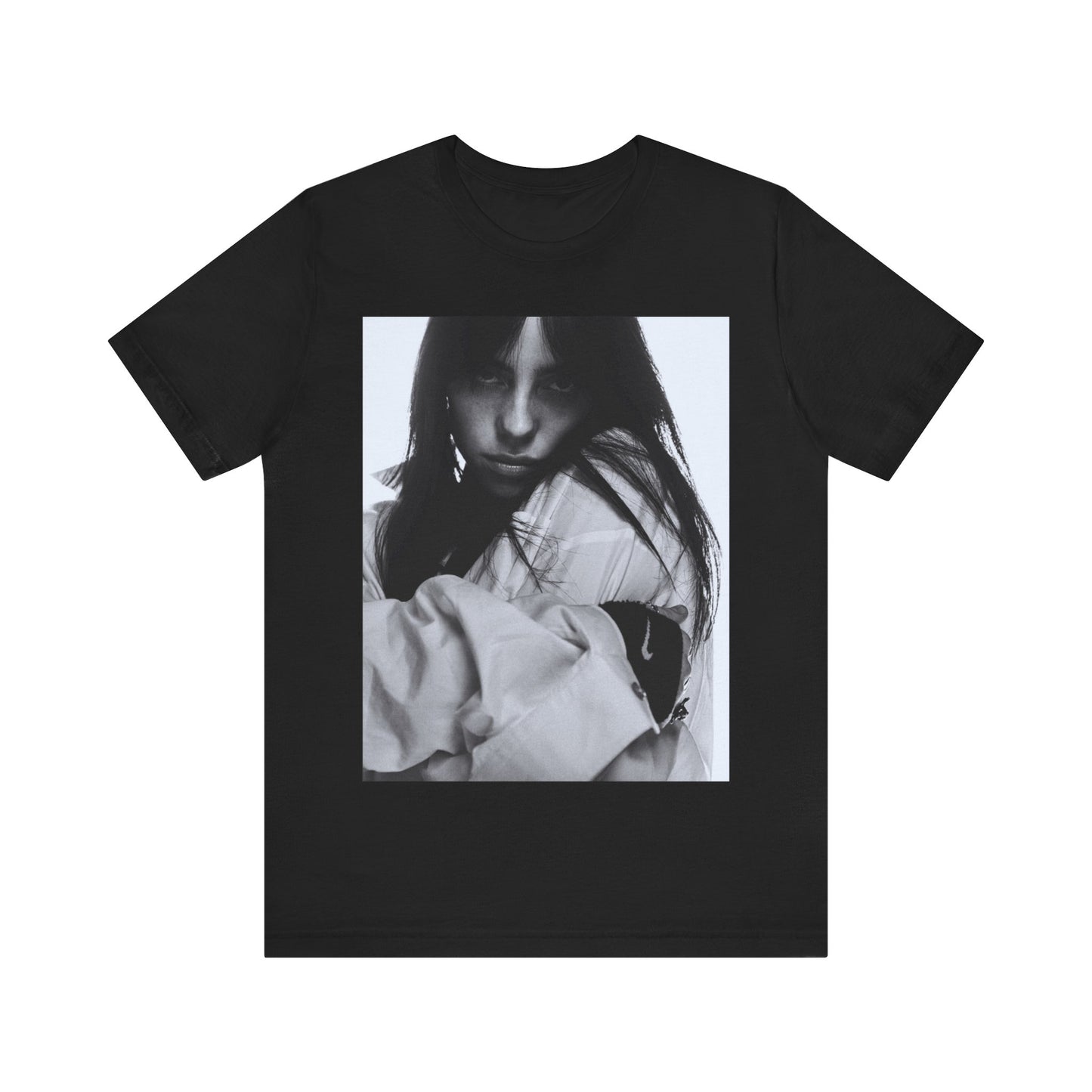 Billie Eilish posing in her signature oversized designer streetwear, printed on a graphic t-shirt.