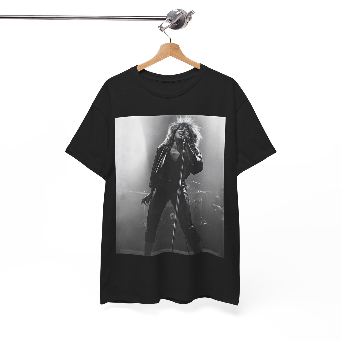 A black graphic t-shirt featuring a graphic of Tina Turner performing "Proud Mary" live.
