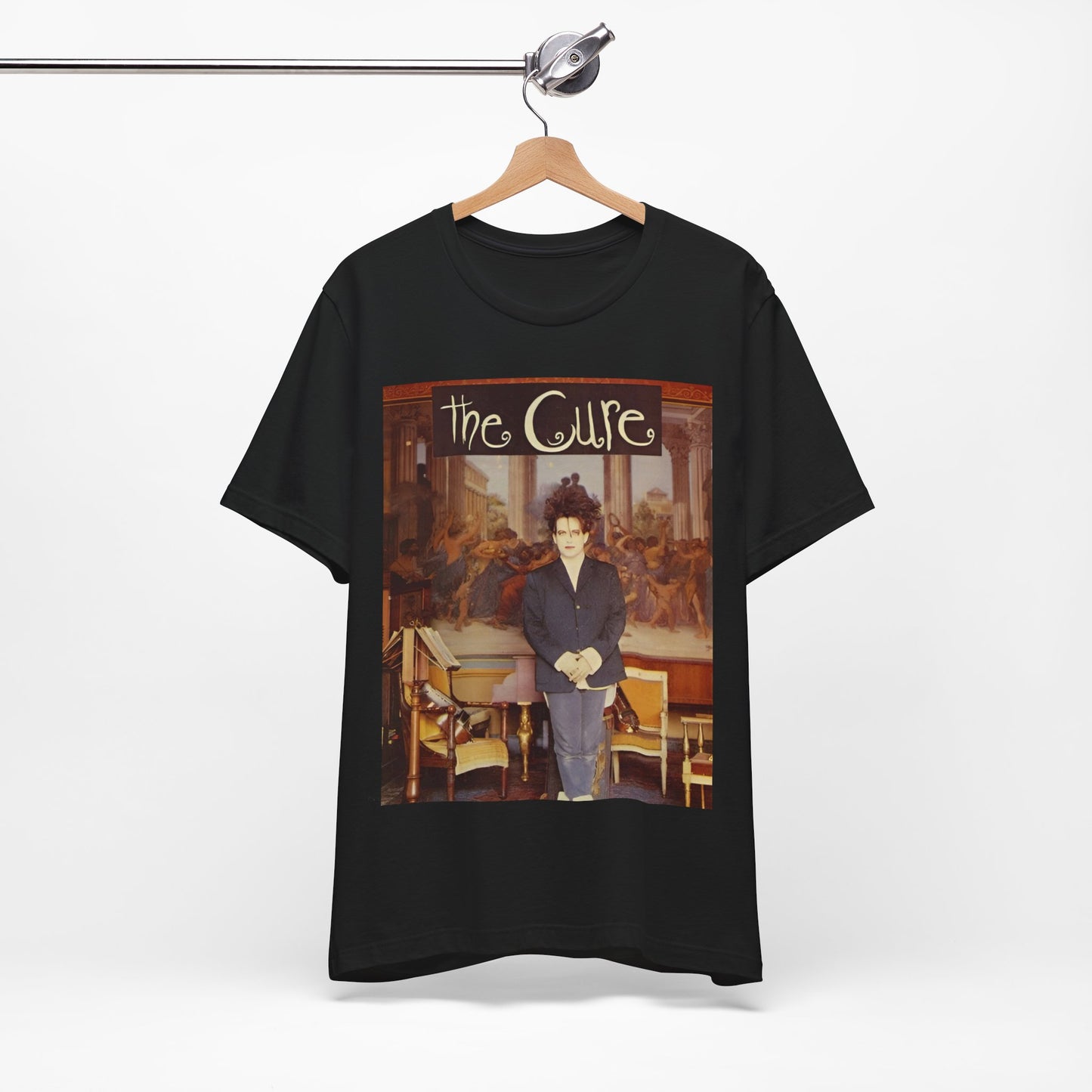 A black graphic t-shirt featuring a graphic of Robert Smith from The Cure as a goth icon.