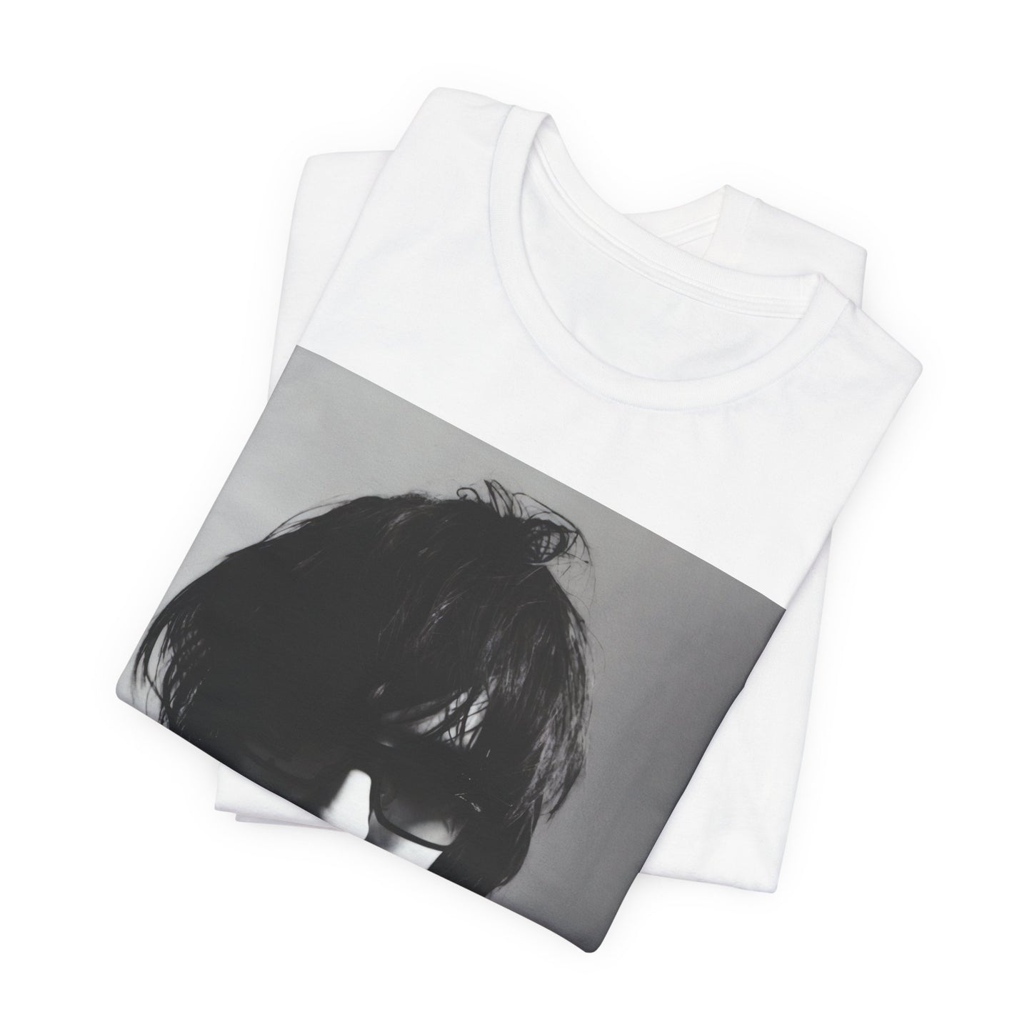 A black graphic t-shirt featuring a graphic related to The Strokes' 'Reptilia' song or era.
