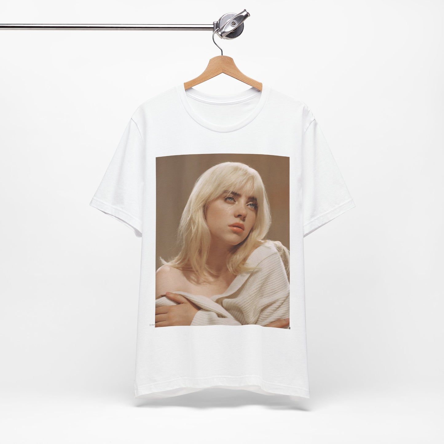 The iconic visual of Billie Eilish with black tears streaming down her face from the 'when the party's over' music video, printed on a t-shirt.
