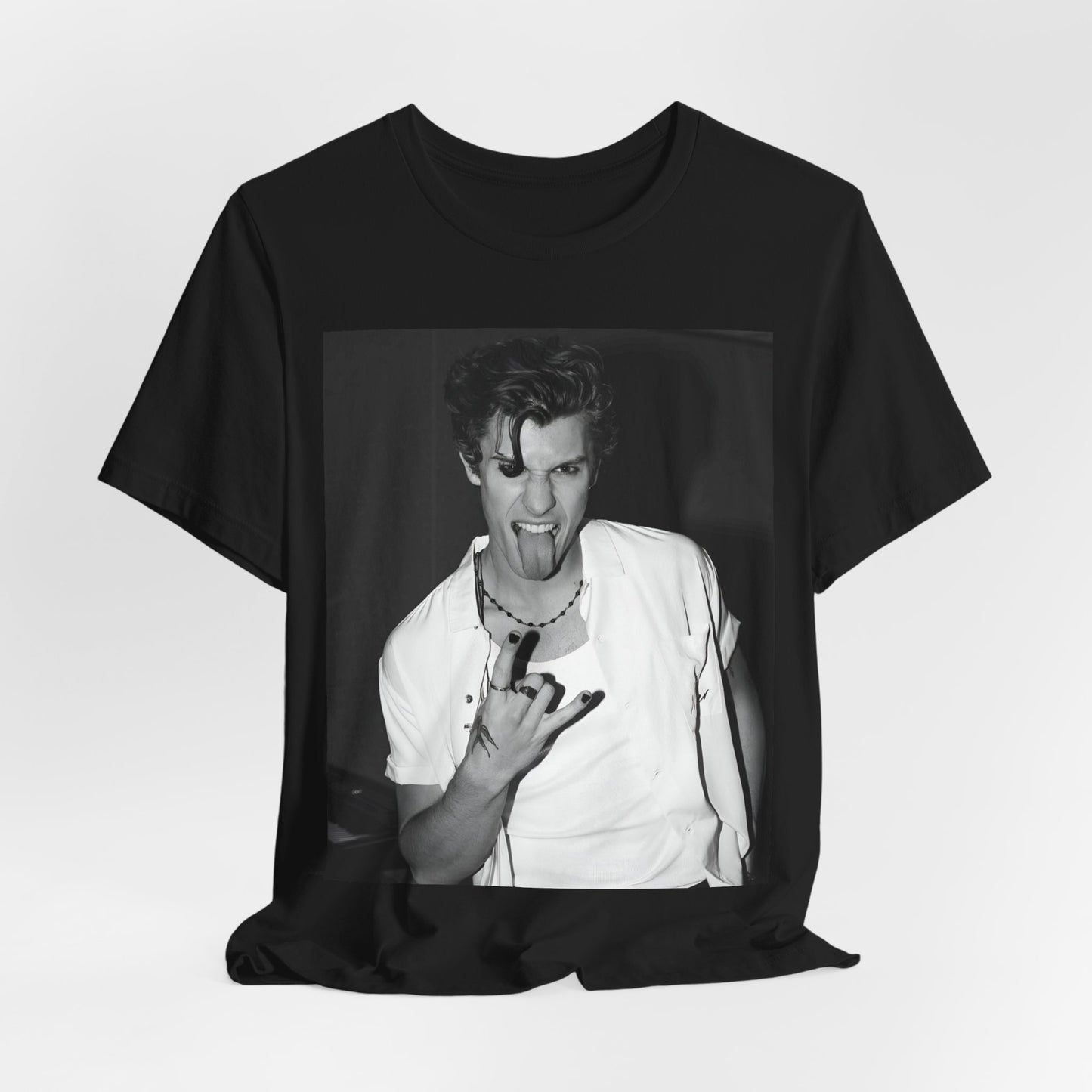 A black graphic t-shirt featuring a casual black and white fan graphic of Shawn Mendes.