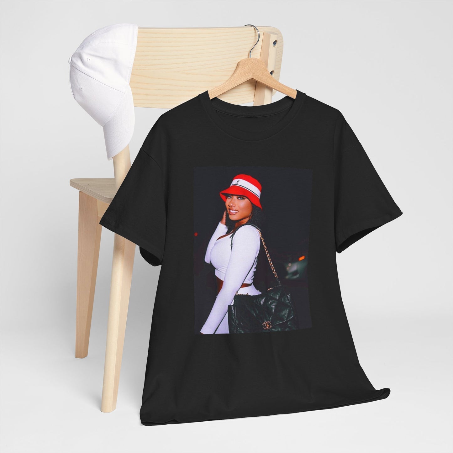 A black graphic t-shirt featuring an iconic fashion graphic of Megan Thee Stallion.