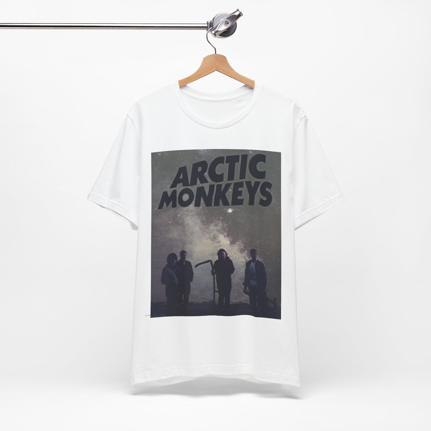A black graphic t-shirt featuring an artistic or aesthetic graphic of the Arctic Monkeys band.