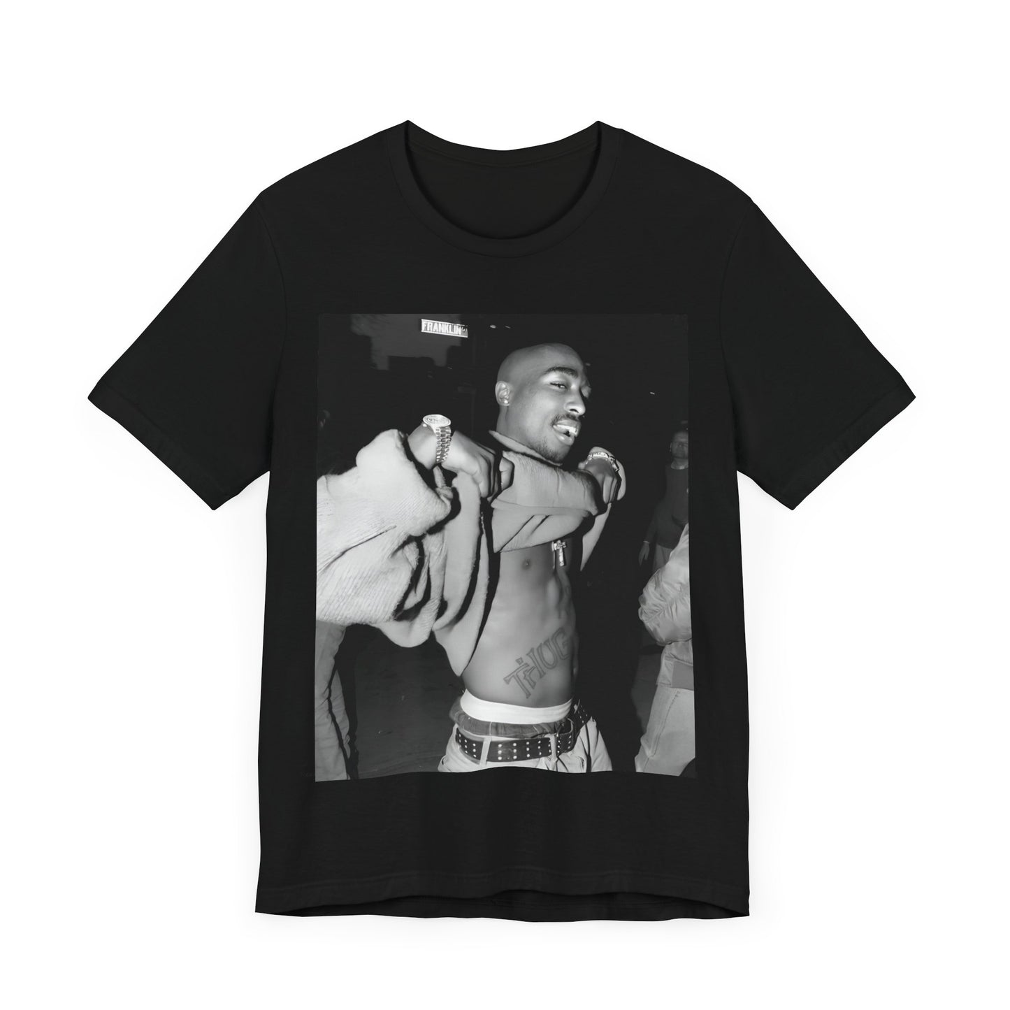 A black graphic t-shirt featuring a vintage hip hop icon graphic of Tupac.