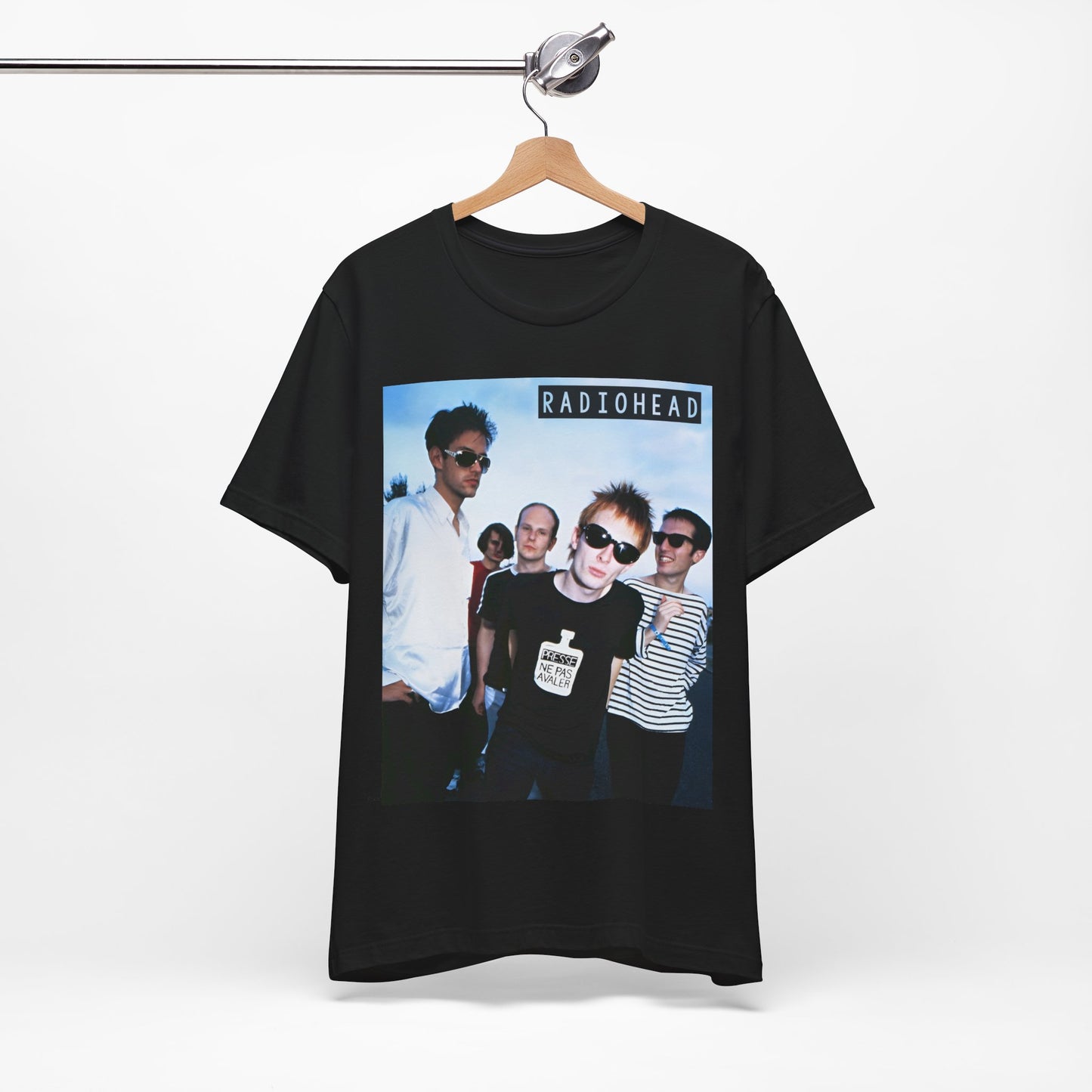 A black graphic t-shirt featuring a vintage alt rock graphic of Radiohead.