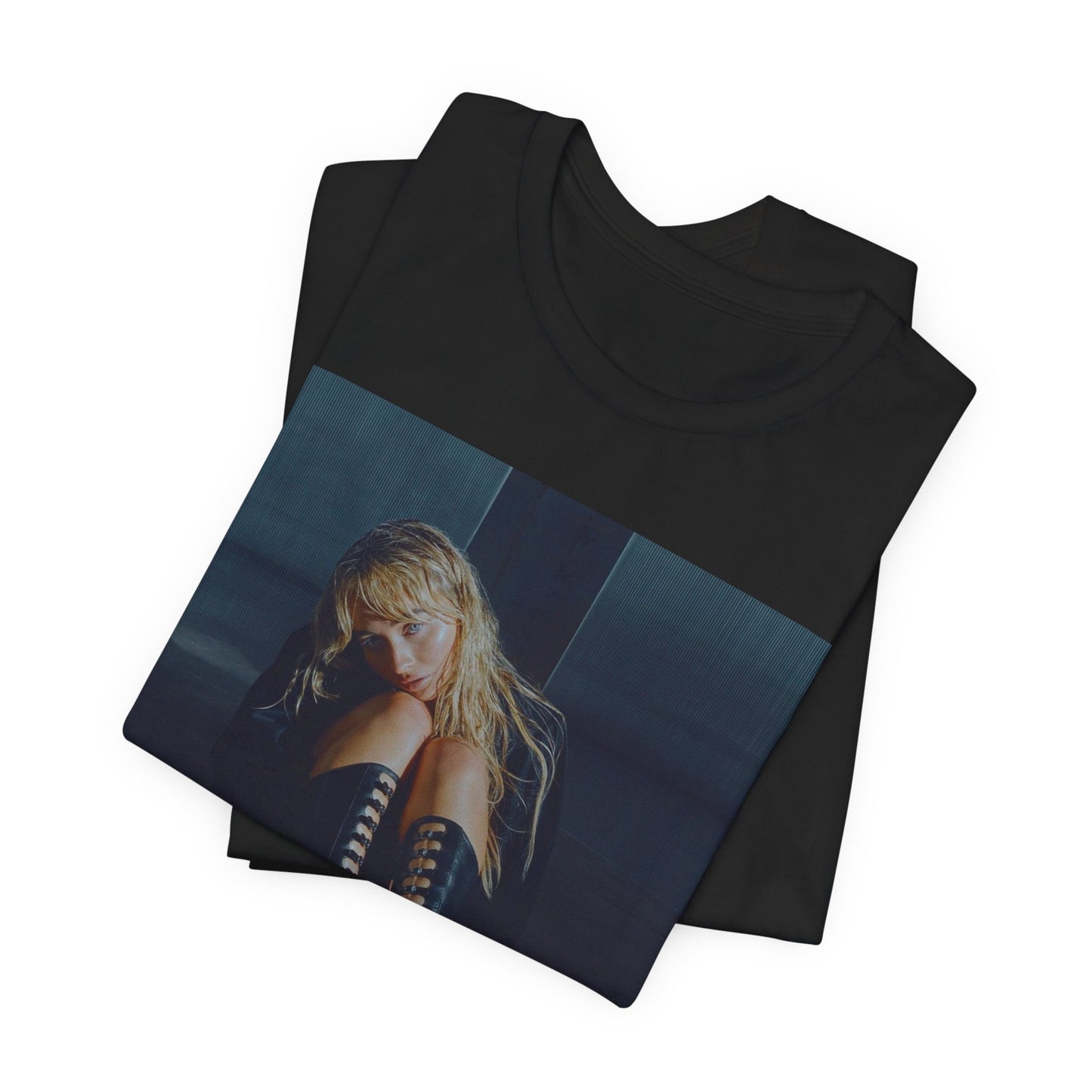 A black graphic t-shirt featuring a bold graphic of Sabrina Carpenter as a pop superstar.
