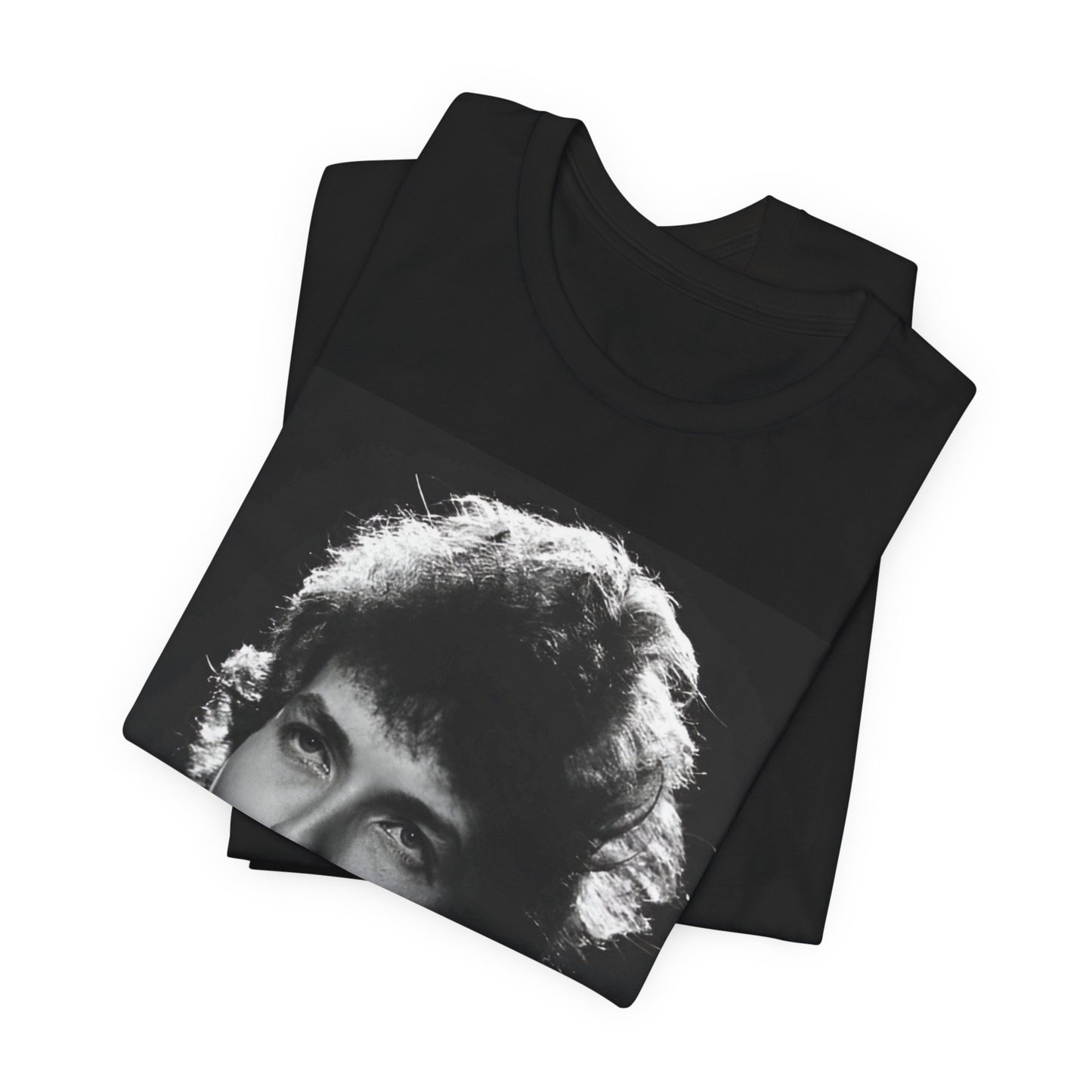 A black graphic t-shirt featuring a graphic of Bob Dylan from the 60s playing his harmonica.