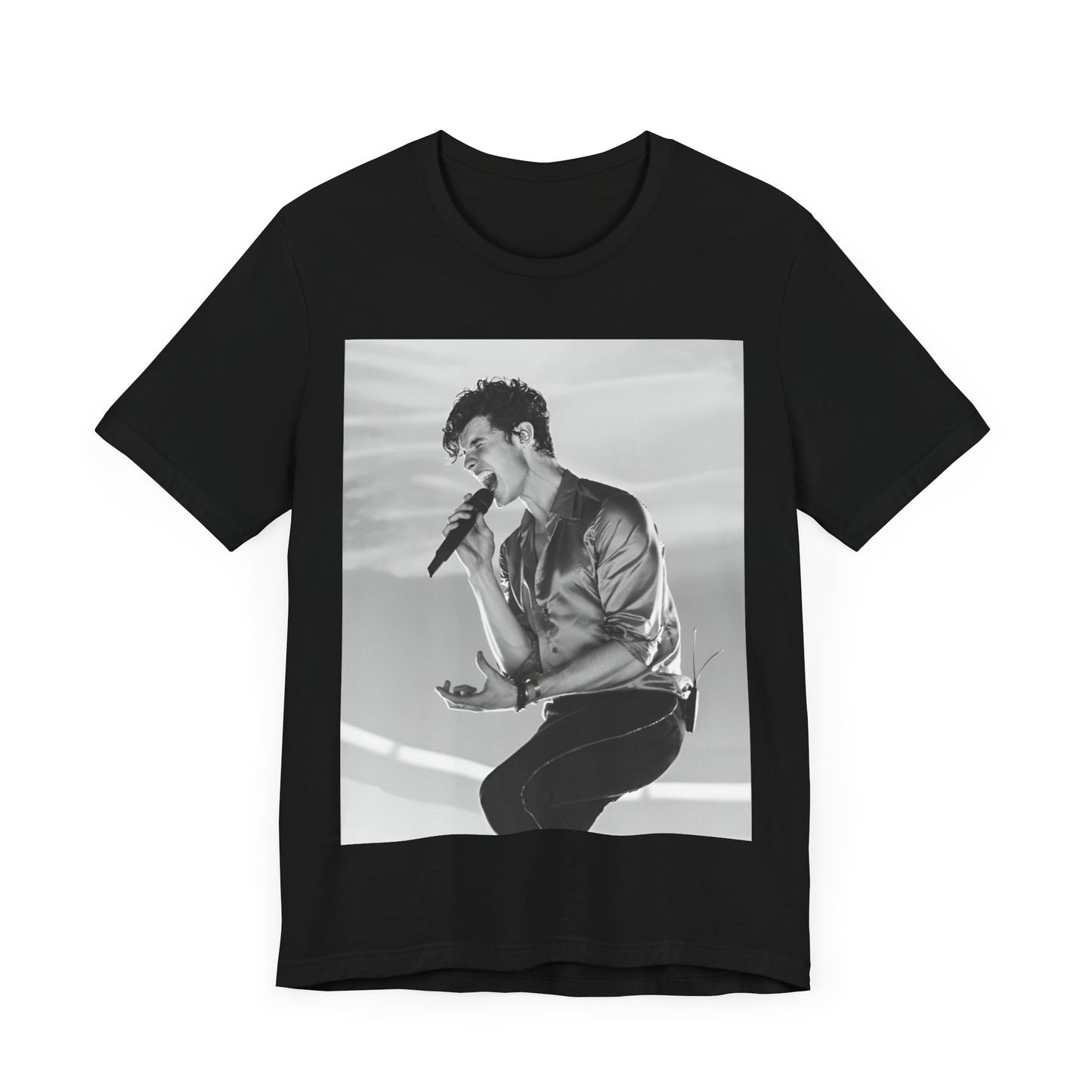 A black graphic t-shirt featuring a black and white graphic or photo of Shawn Mendes as a dreamy pop star.