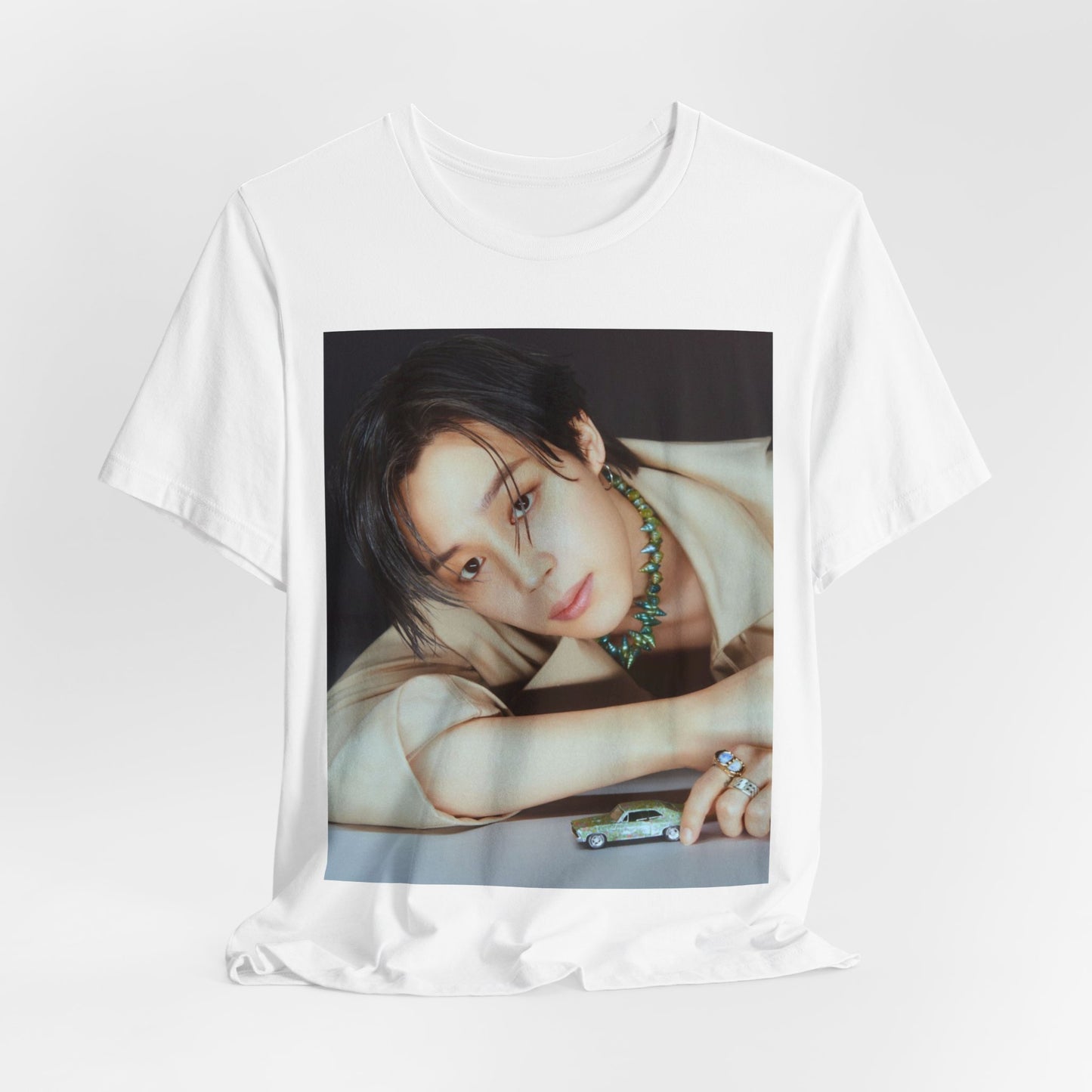 A black graphic t-shirt featuring a retro graphic related to Jimin's 'Filter' era.