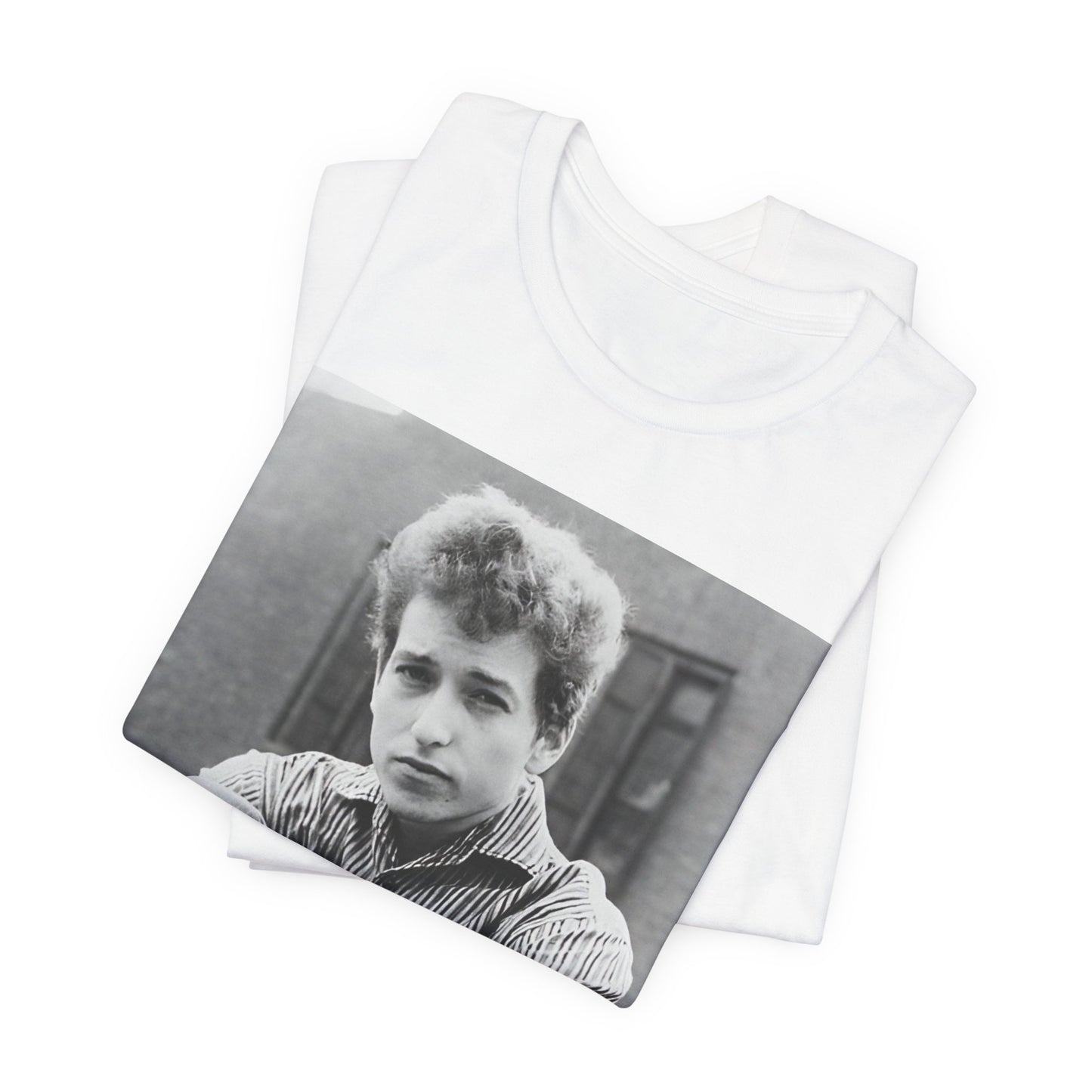A black graphic t-shirt featuring a graphic of Bob Dylan from his 60s origins in folk music.