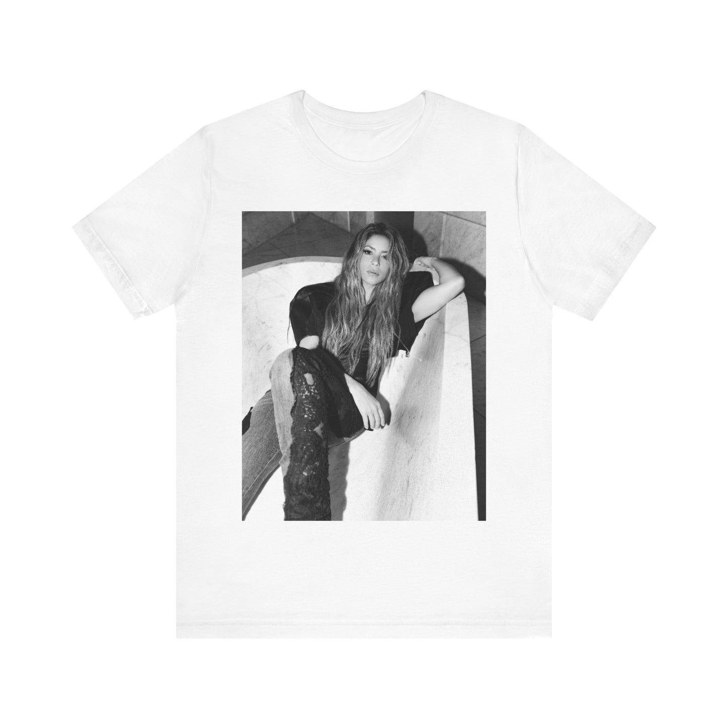 A black graphic t-shirt featuring a retro graphic related to Shakira's 'Hips Don't Lie' song or era.