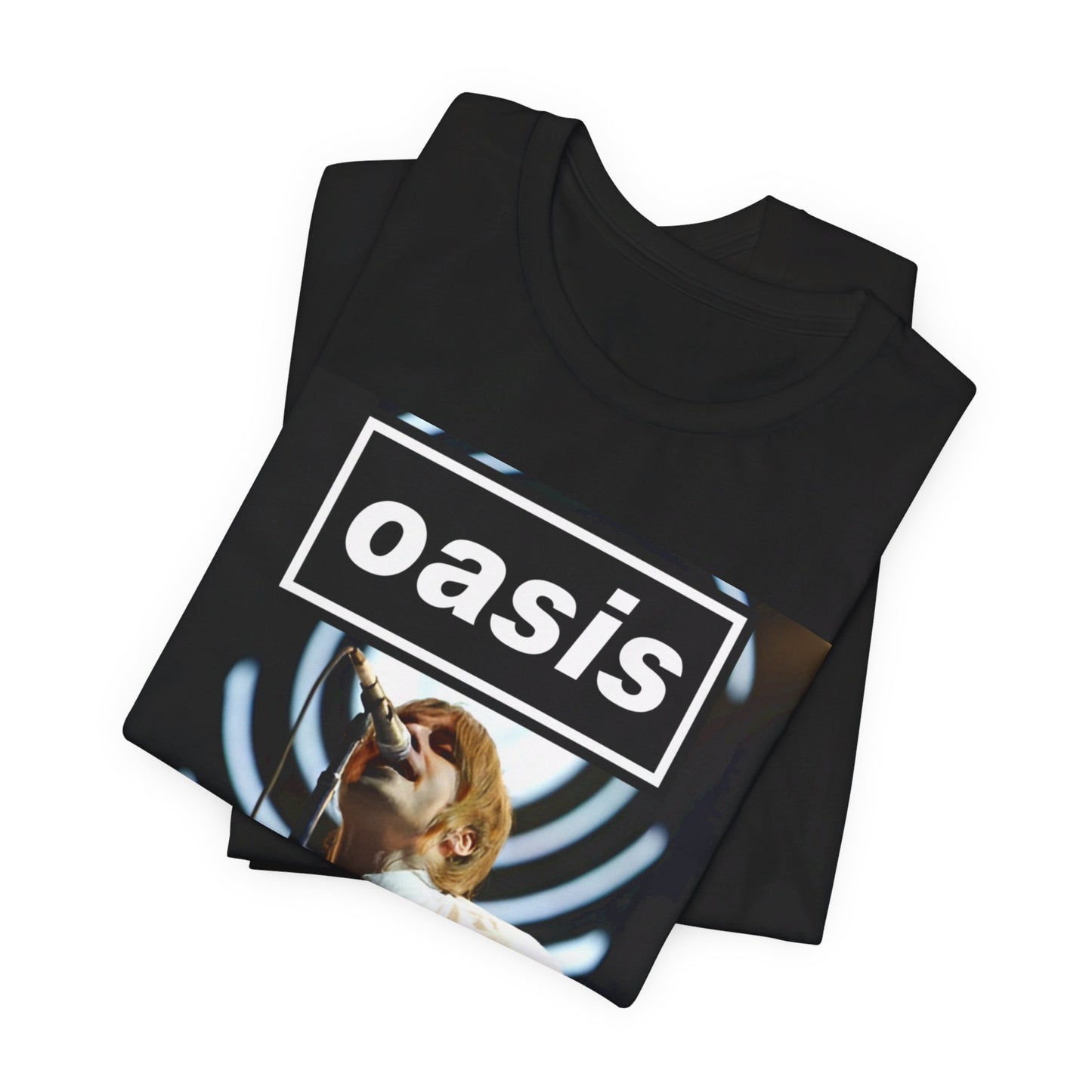 A black graphic t-shirt featuring a graphic or photo of Oasis performing live.