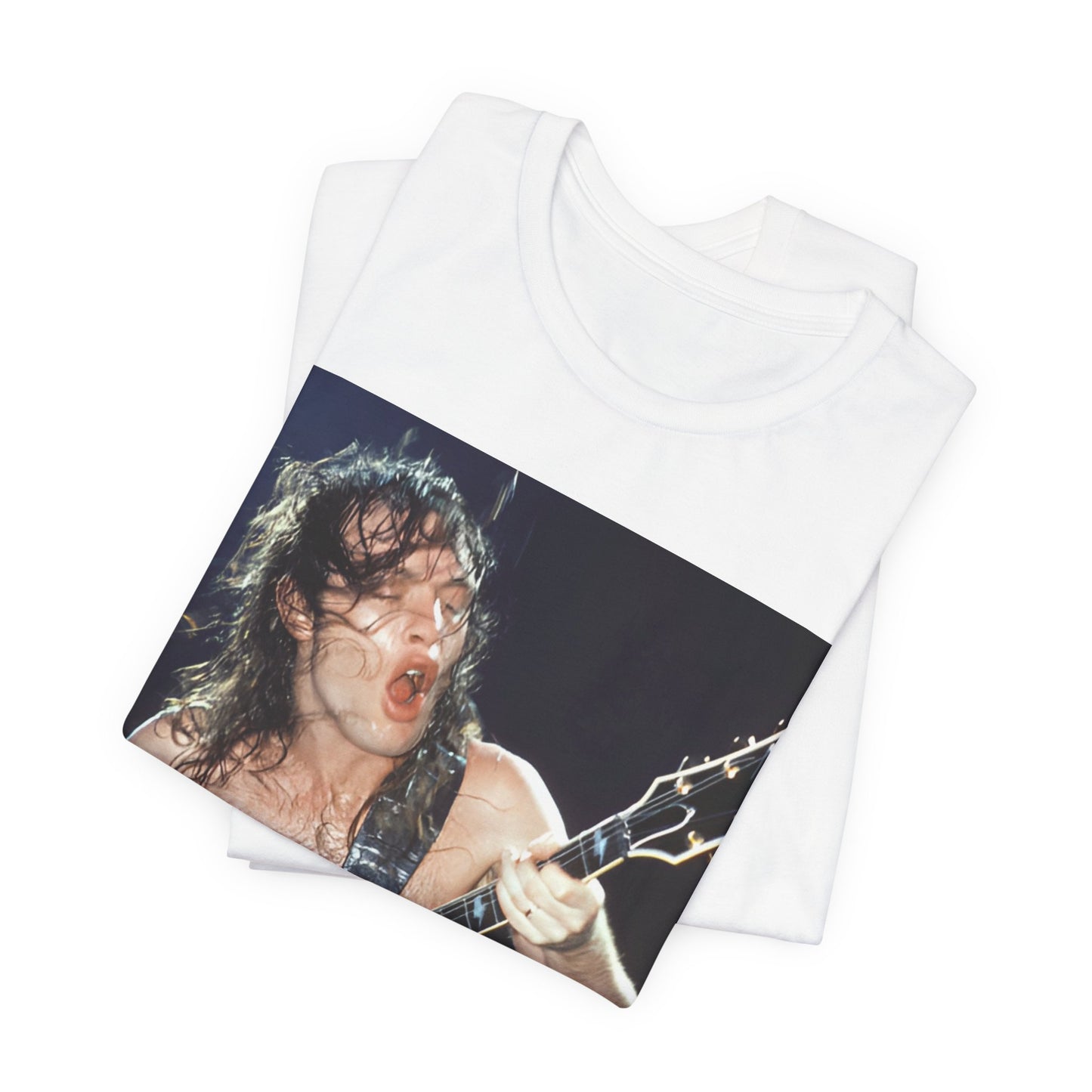 A graphic of AC/DC's lead guitarist, Angus Young, performing with high energy live on stage, printed on a t-shirt.
