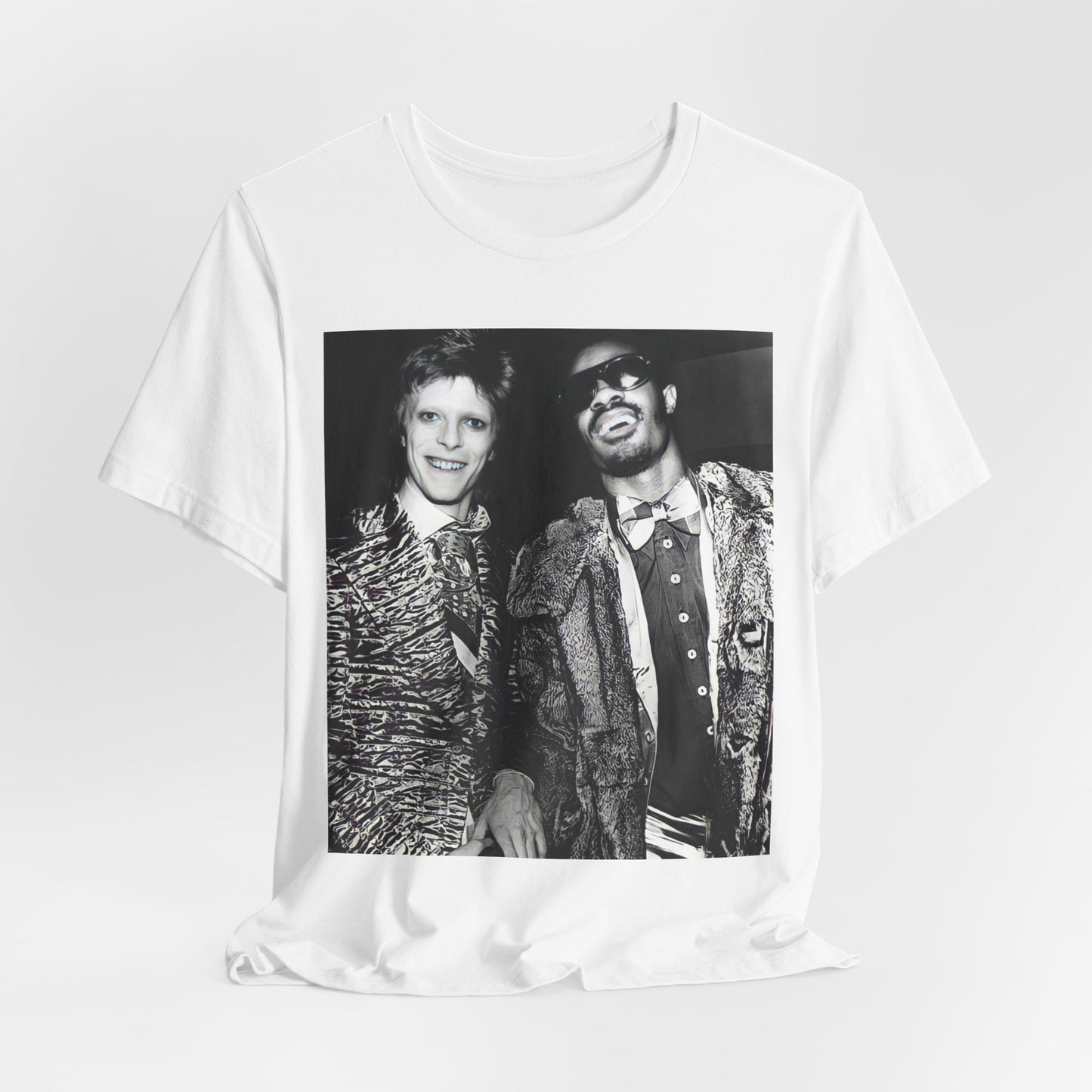 A black graphic t-shirt featuring a retro graphic of Stevie Wonder and David Bowie together.
