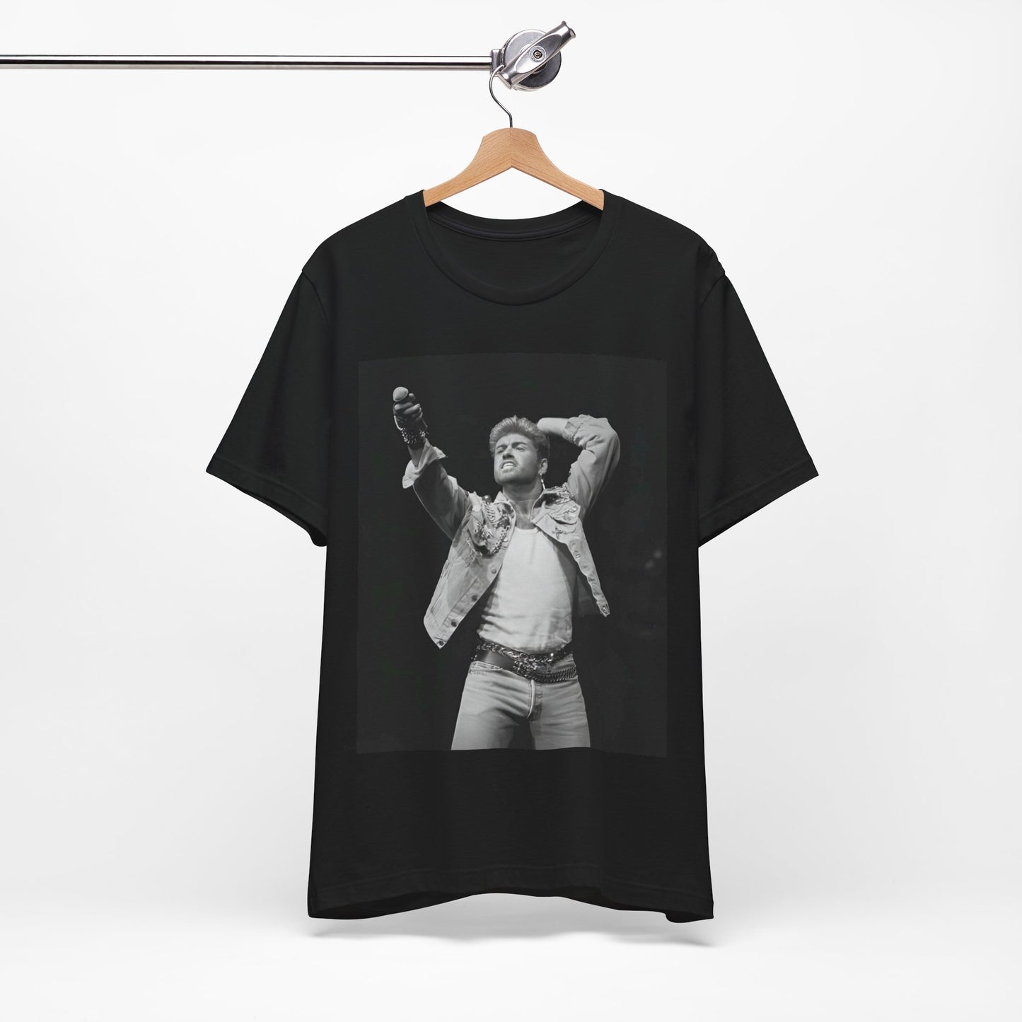 A black graphic t-shirt featuring a graphic or photo of George Michael performing live on stage.