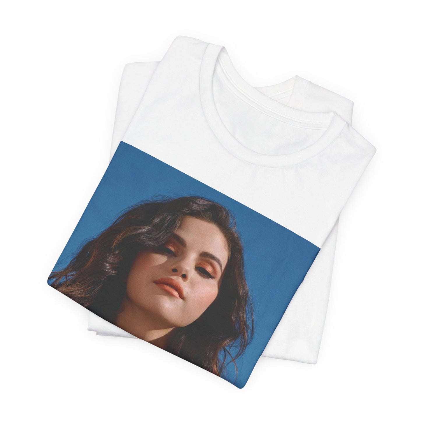 A black graphic t-shirt featuring a vintage pop icon graphic of Selena Gomez.
