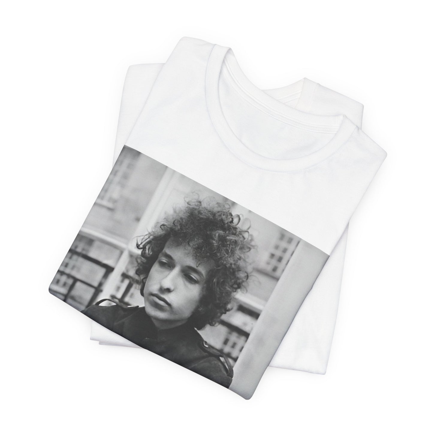 A black graphic t-shirt featuring a black and white graphic of Bob Dylan from the folk revival era.