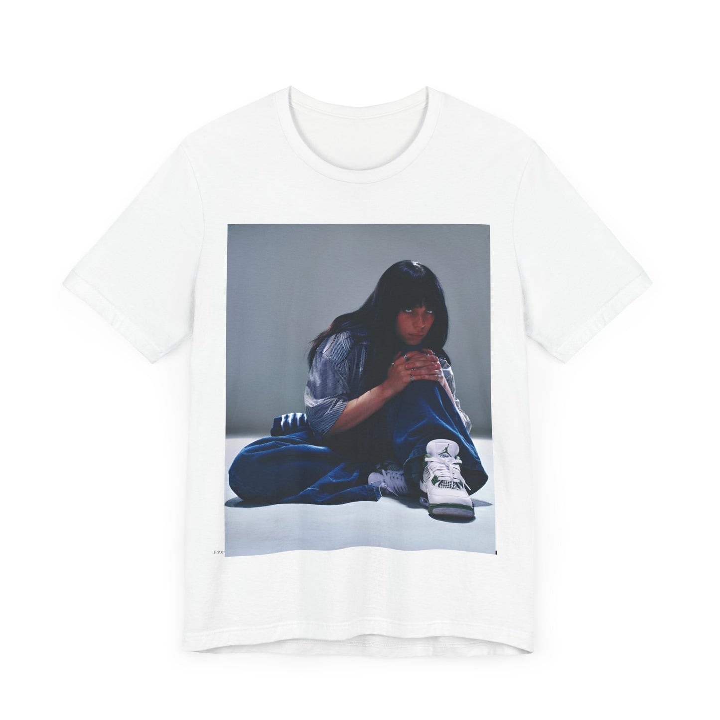 An artistic and slightly melancholic graphic t-shirt inspired by Billie Eilish's song "Lovely," featuring soft colors and a dreamy style.