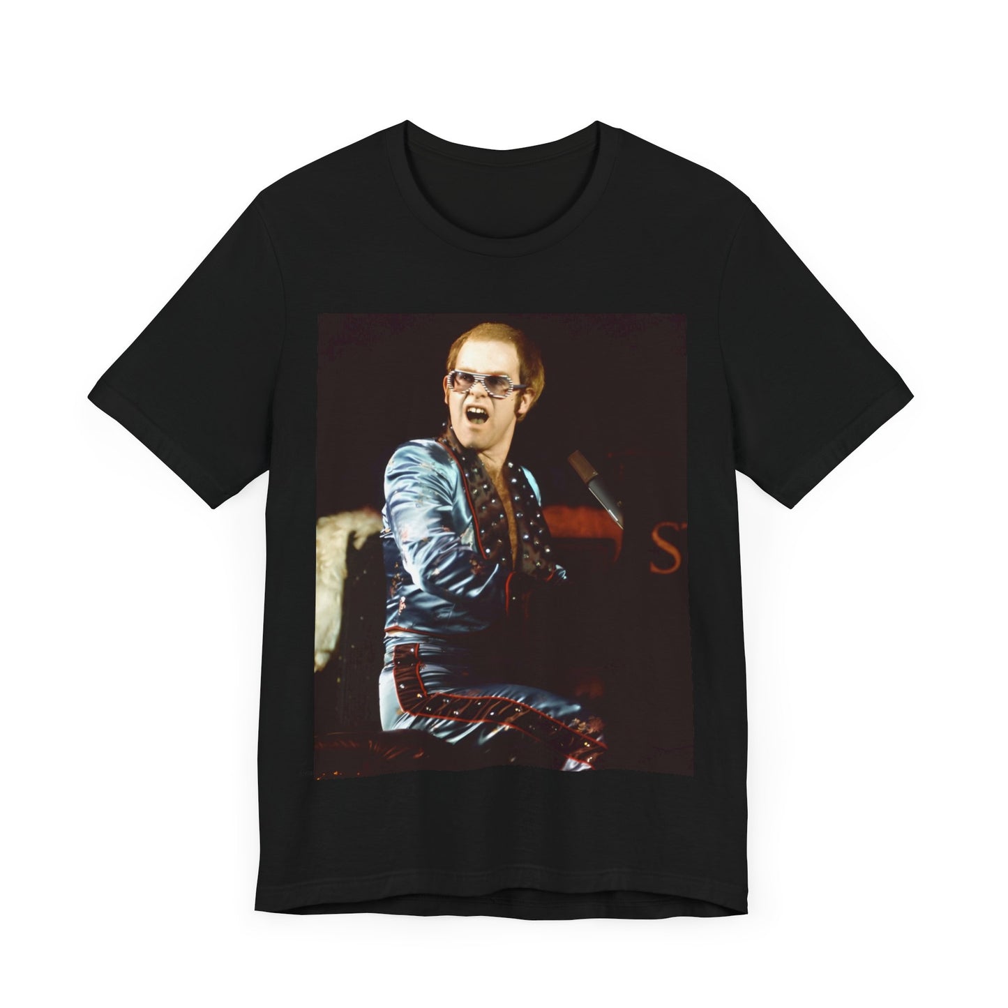 A black graphic t-shirt featuring a retro graphic related to Elton John's 'Rocket Man' song or era.