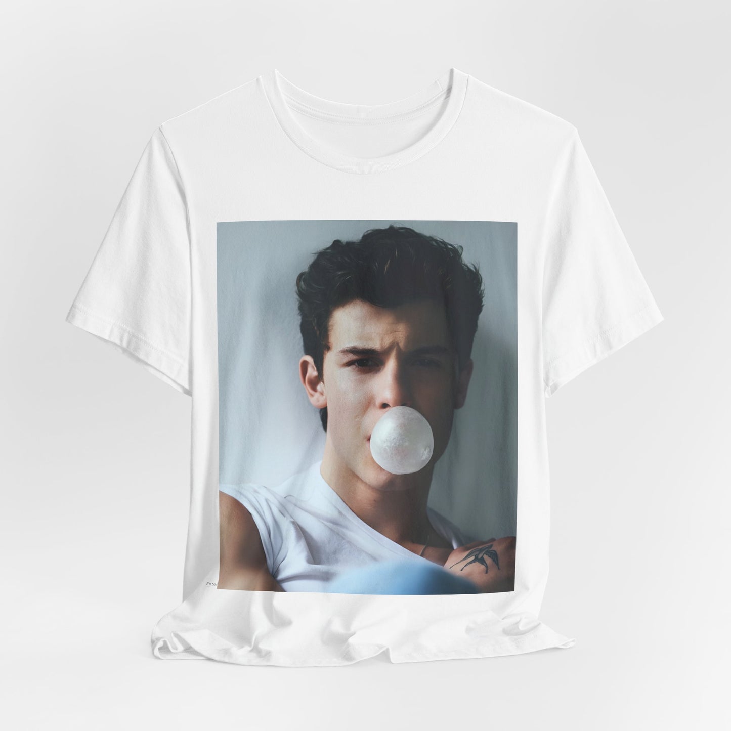 A black graphic t-shirt featuring a photo of Shawn Mendes with a fierce, confident gaze.