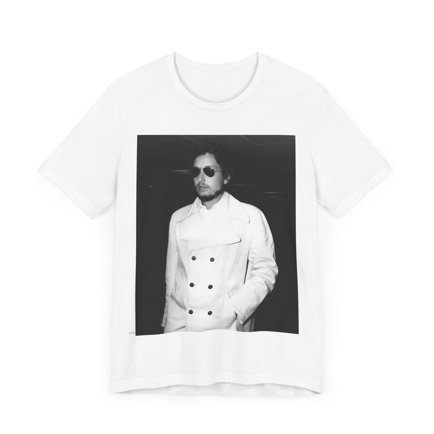 A black graphic t-shirt featuring a vintage black and white photo of Bob Dylan in a contemplative or iconic pose.
