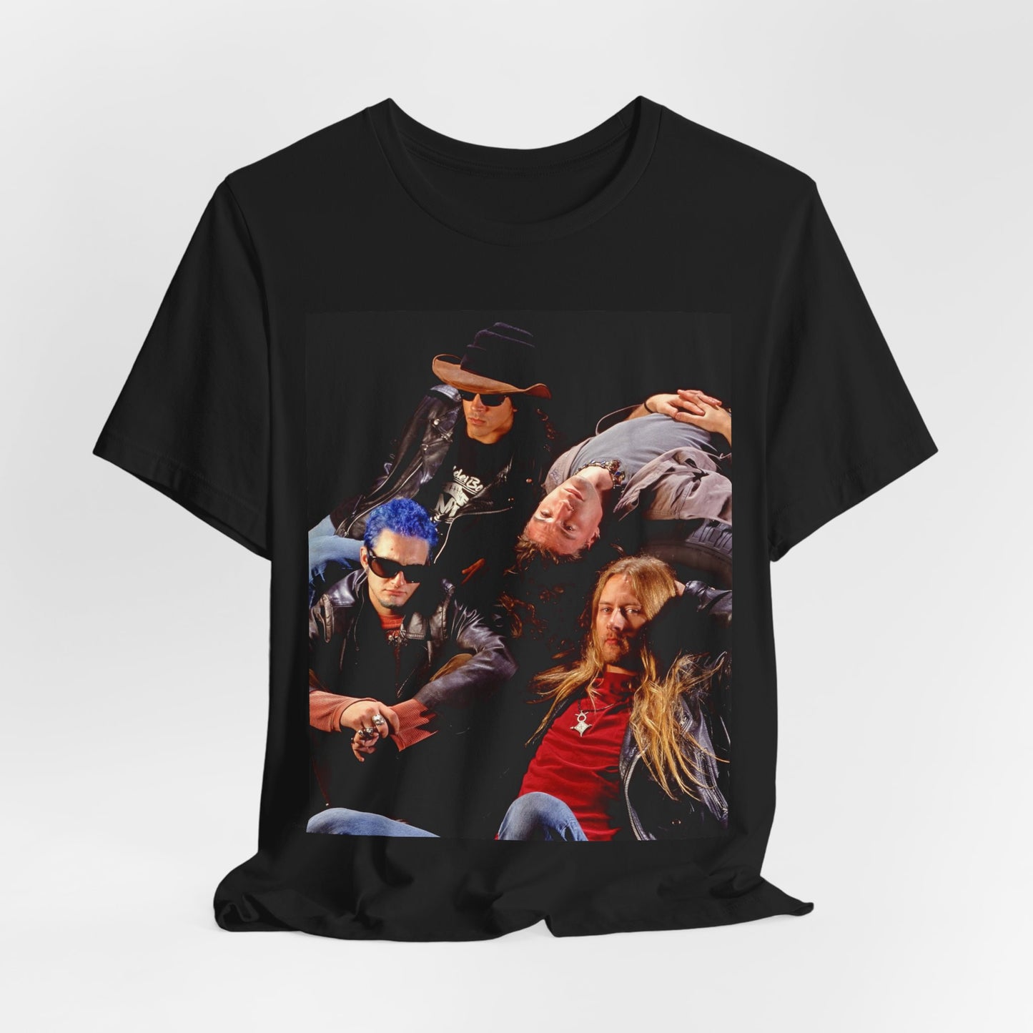A black graphic t-shirt featuring a 90s grunge rock band graphic for Alice In Chains, possibly with band members or stylized elements.