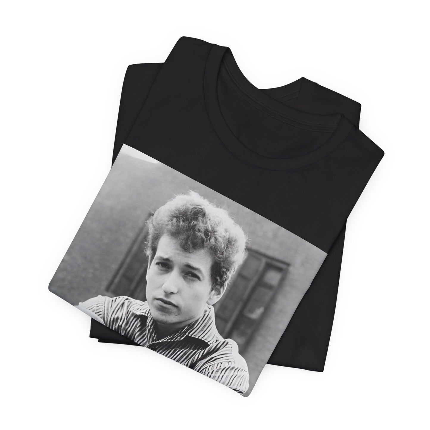 A black graphic t-shirt featuring a graphic of Bob Dylan from his 60s origins in folk music.