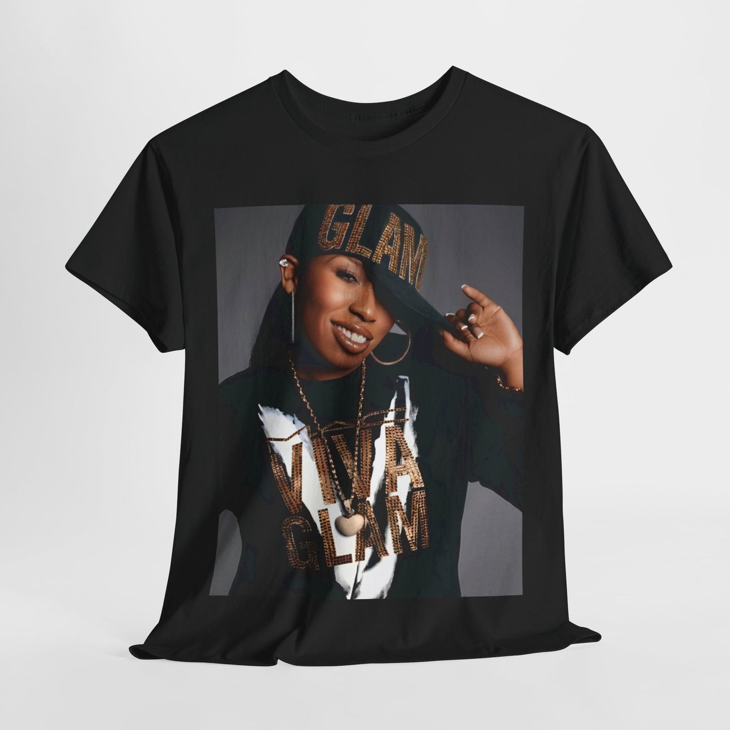 A black graphic t-shirt featuring a 90s graphic of Missy Elliott as a global rap phenomenon.