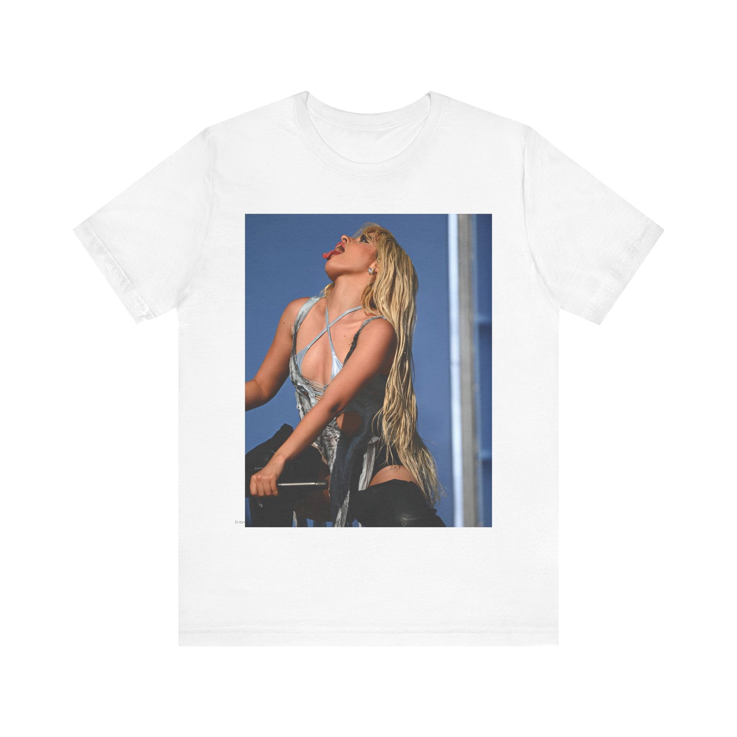 A black graphic t-shirt featuring a dynamic graphic or photo of Camila Cabello performing live on stage.