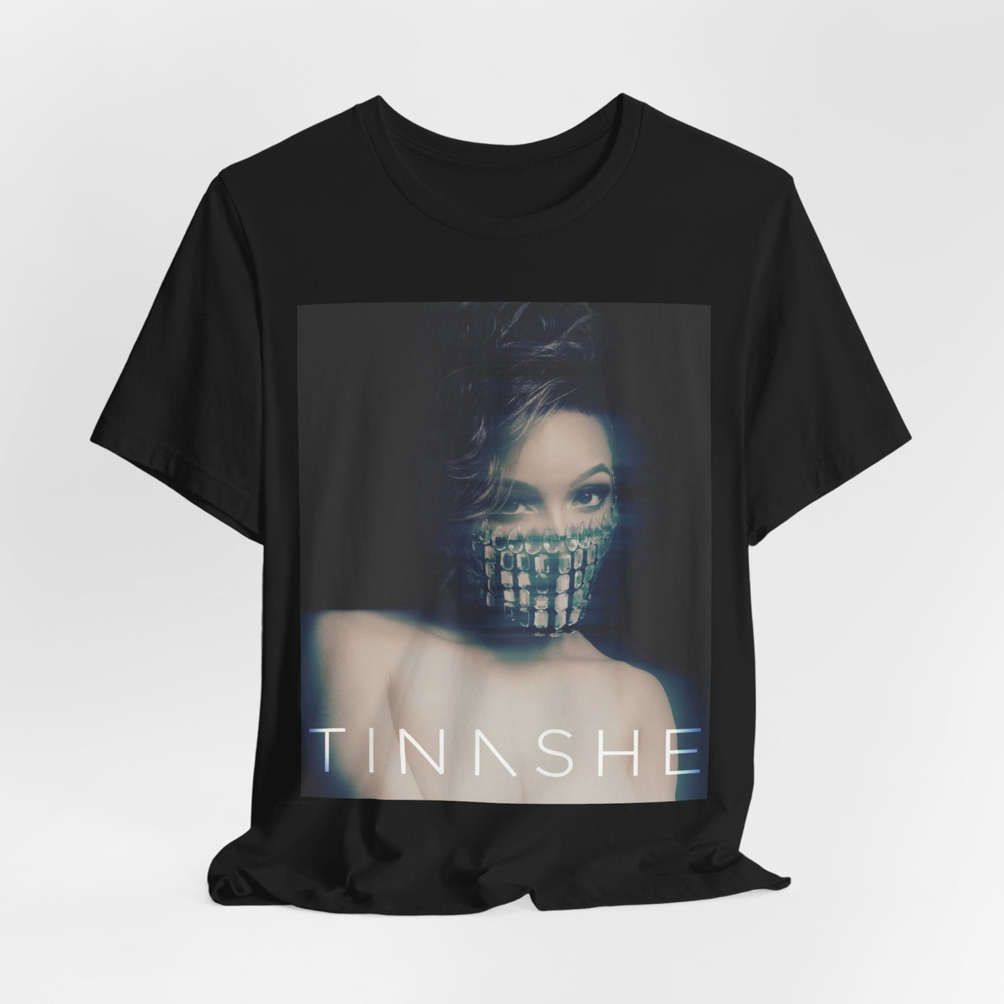 A black graphic t-shirt featuring the album cover art for Tinashe's 'Aquarius'.