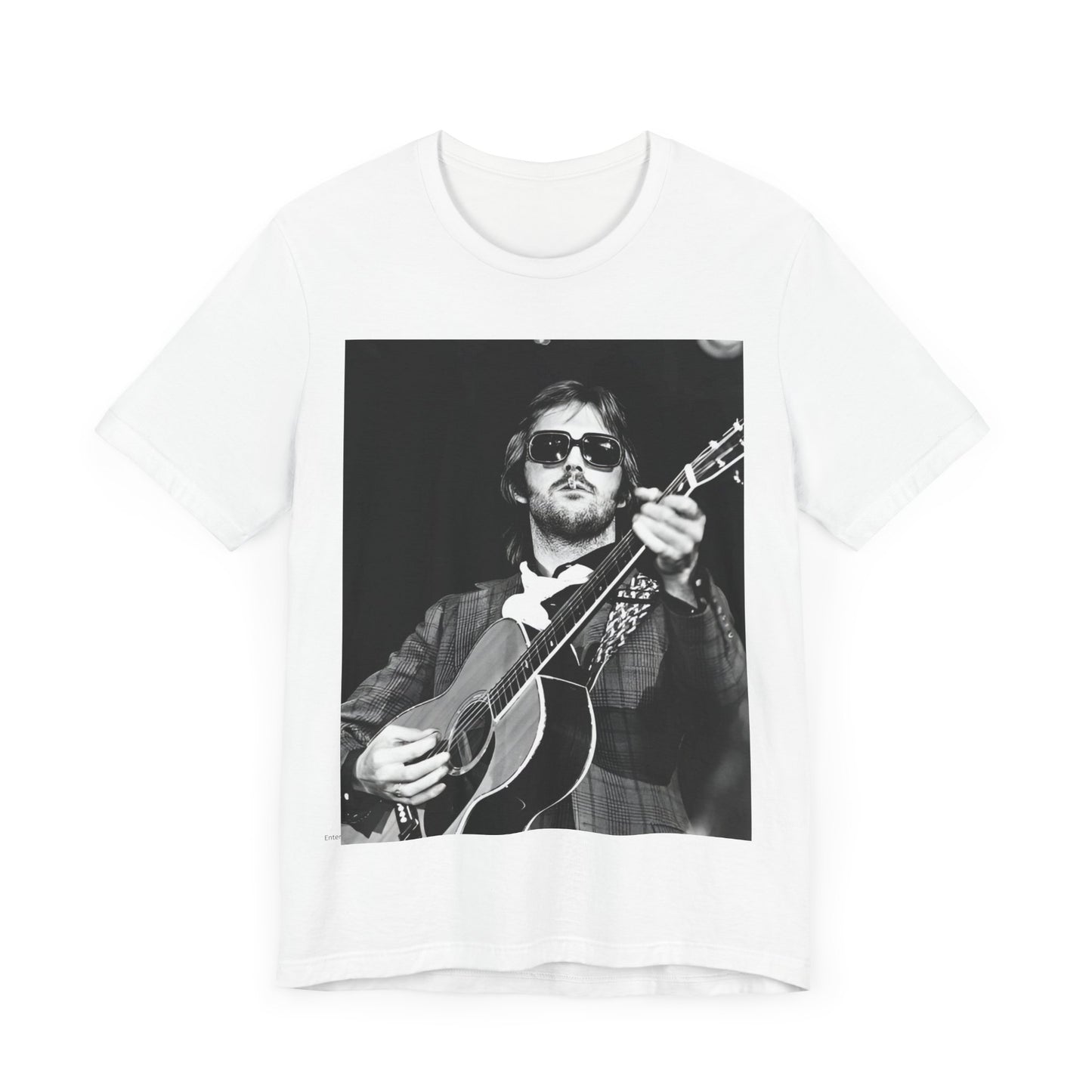 A black graphic t-shirt featuring a graphic of Eric Clapton with a chill blues rock vibe.