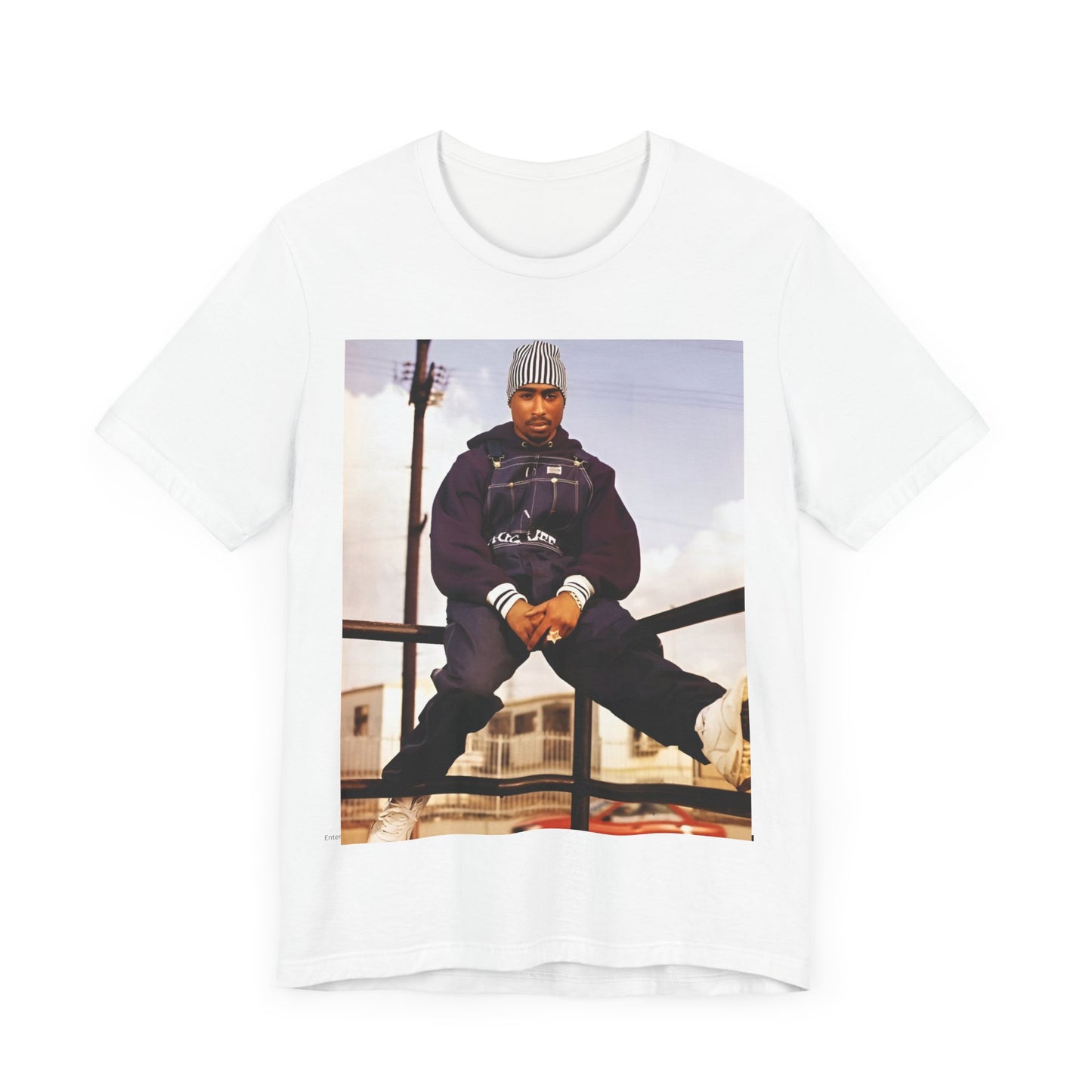 A black graphic t-shirt featuring a timeless rap legend graphic of Tupac.