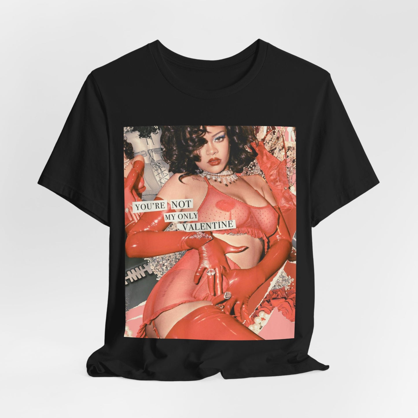 A black graphic t-shirt featuring a graphic of Rihanna with a 'hot valentine' theme.