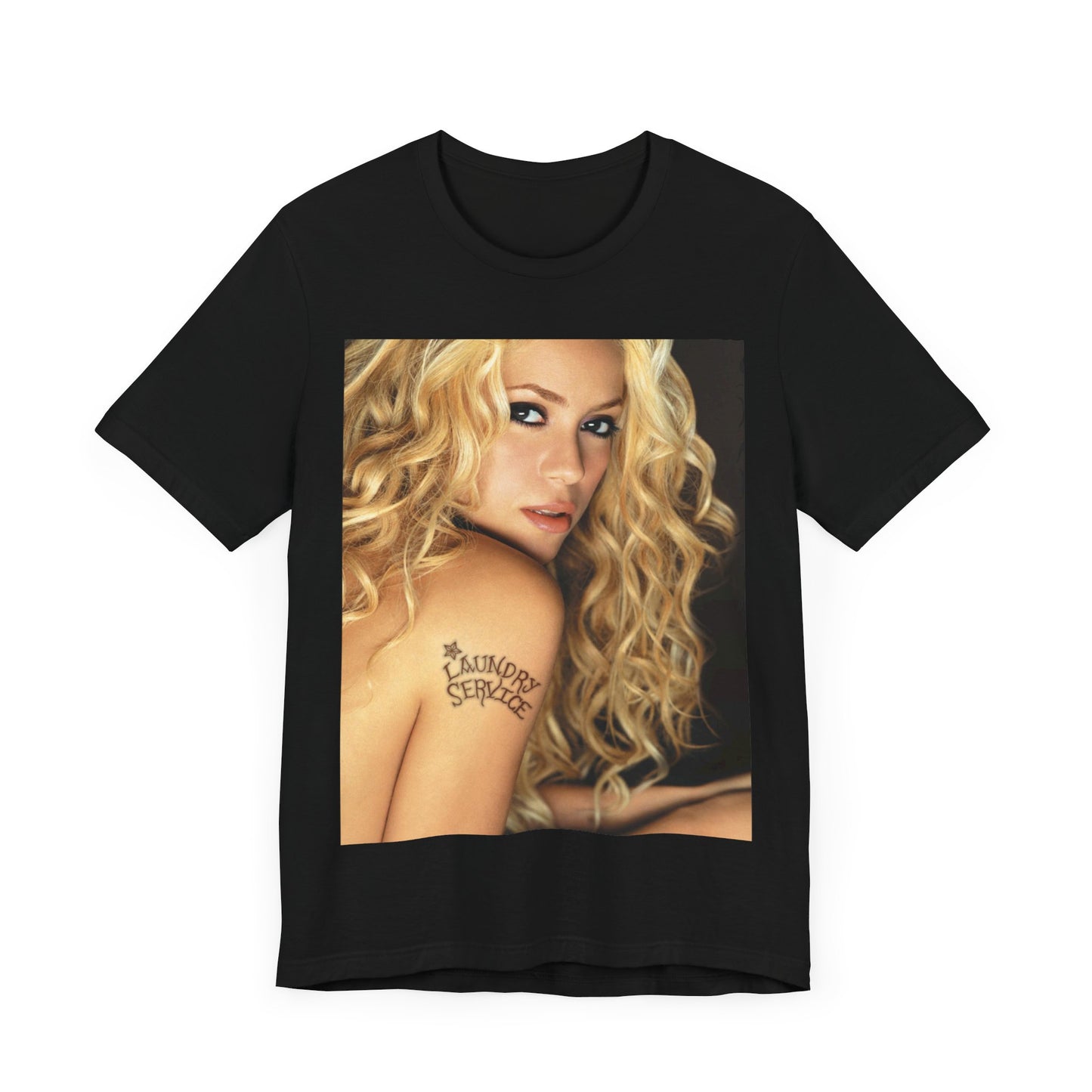 A black graphic t-shirt featuring a glamorous portrait graphic of Shakira.