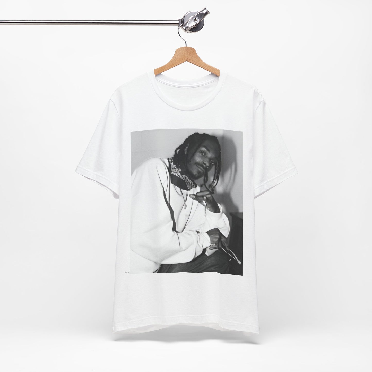 A black graphic t-shirt featuring a black and white hip hop graphic or photo of Snoop Dogg.