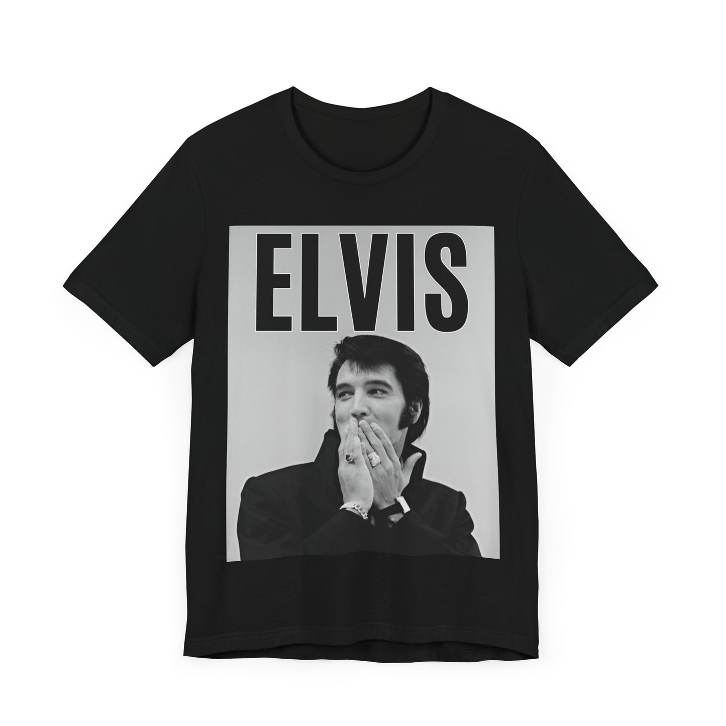 A black graphic t-shirt featuring a retro graphic of Elvis Presley as a 'Rebel With A Cause.'