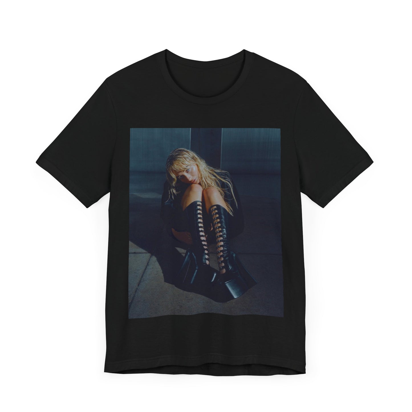 A black graphic t-shirt featuring a bold graphic of Sabrina Carpenter as a pop superstar.