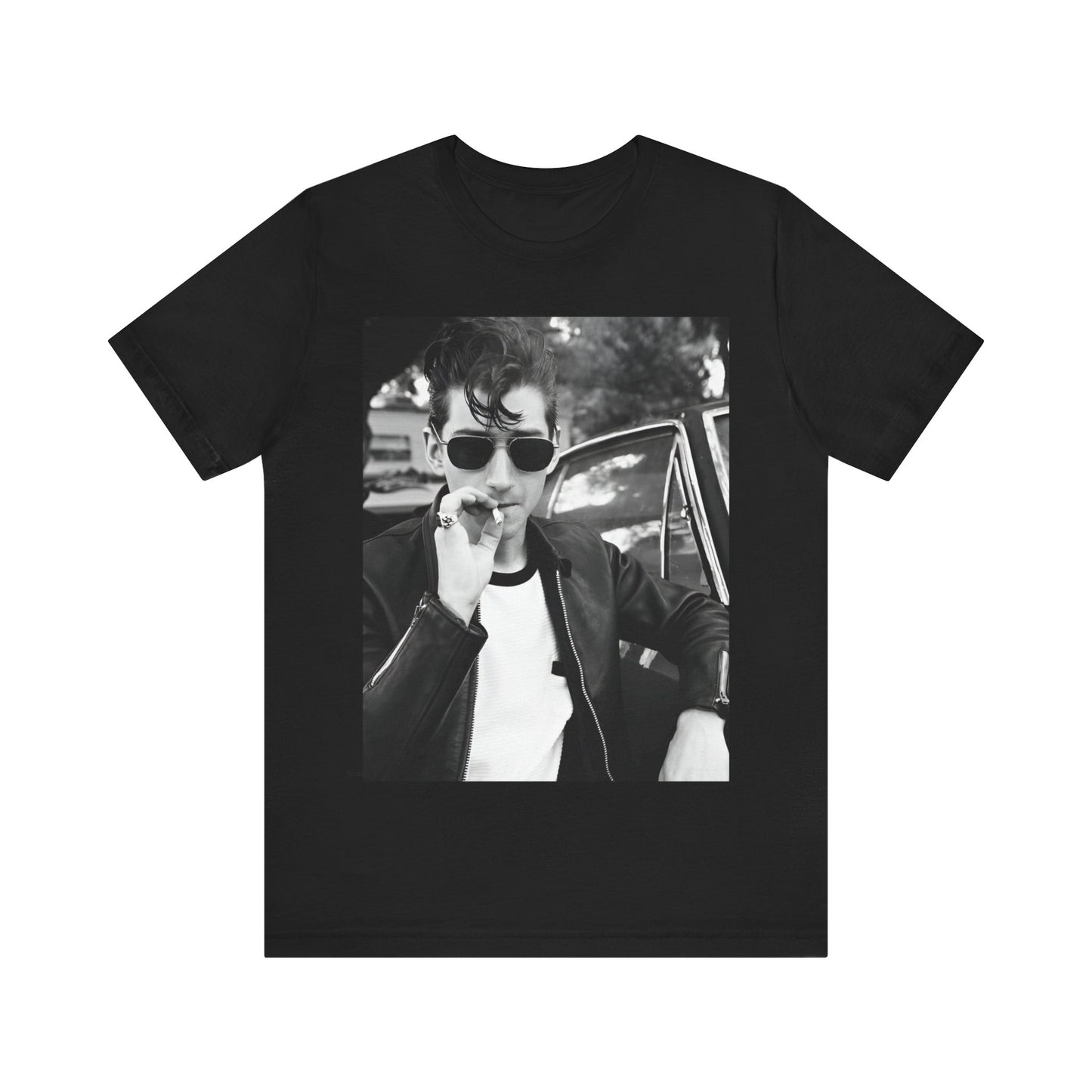 A black graphic t-shirt featuring a classic rock-style graphic of the Arctic Monkeys, possibly with band members in a stylized design.