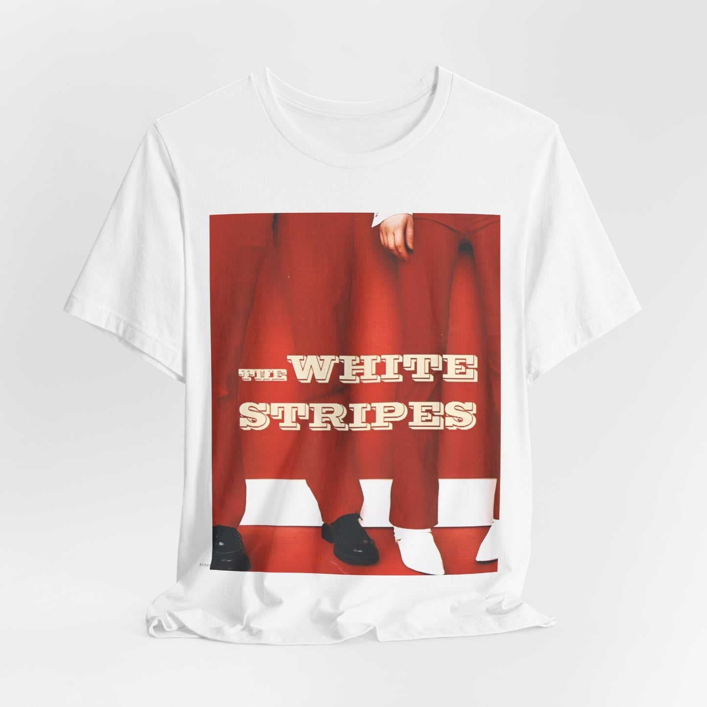 A black graphic t-shirt featuring a red and white signature graphic of The White Stripes.