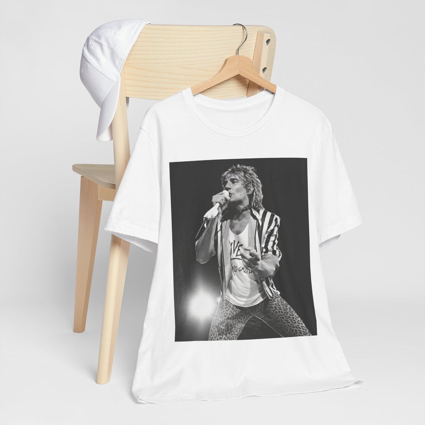 A black graphic t-shirt featuring a black and white portrait photo of Rod Stewart.